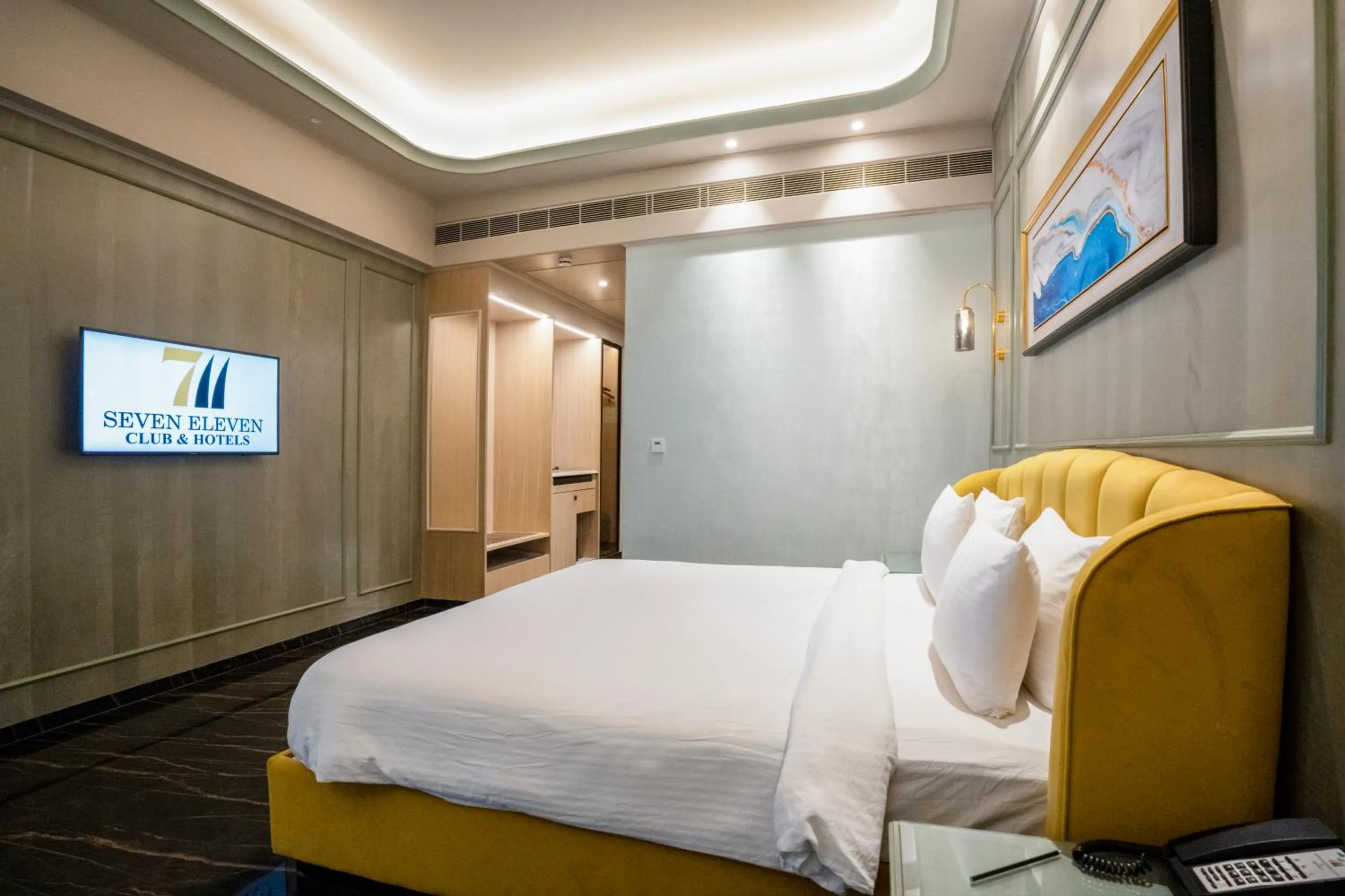 Bed in Seven Eleven Hotels and Club