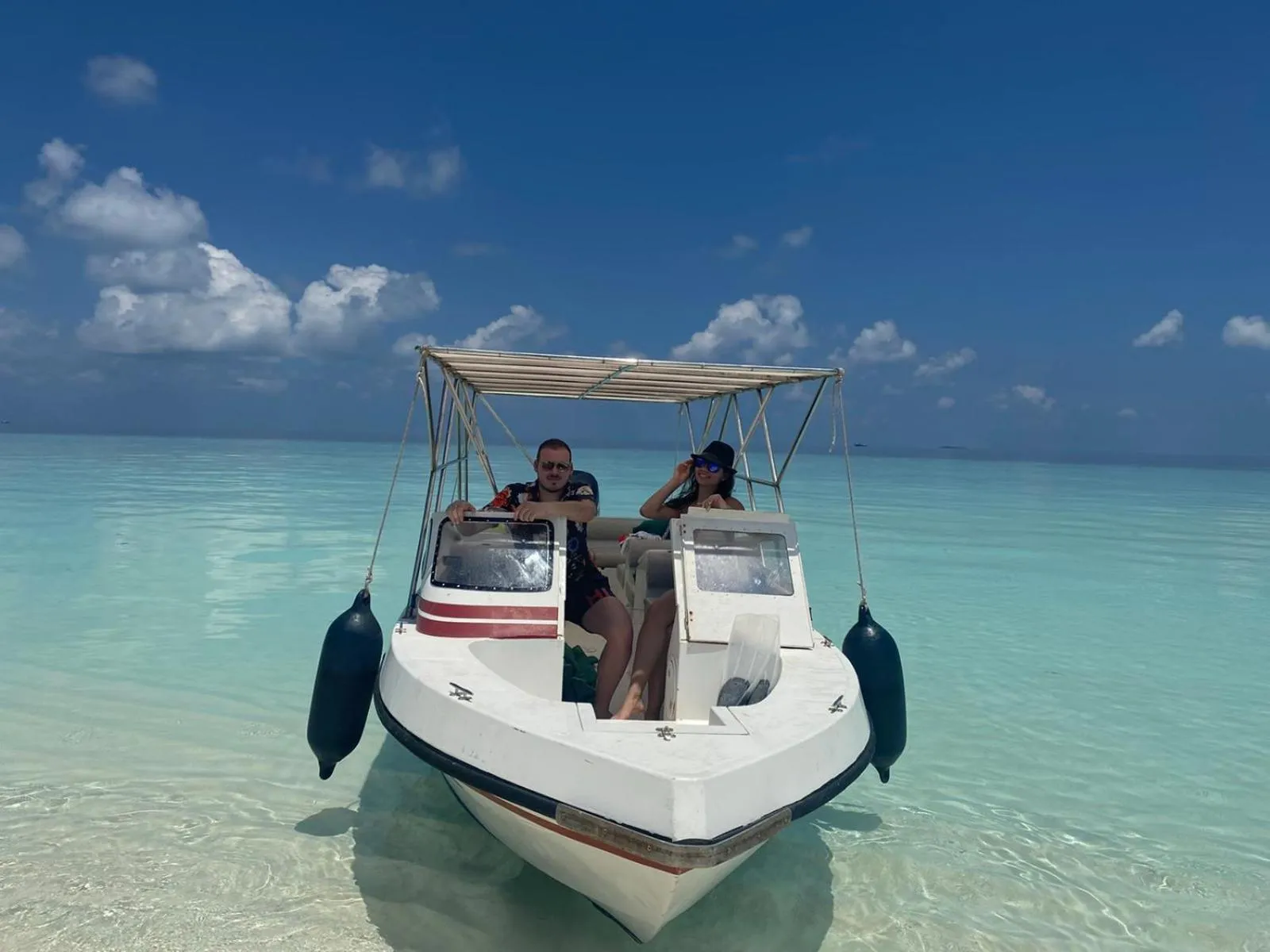 People in Turtle Maldives - Your Gateway to the Beach & Marine Adventures Await!