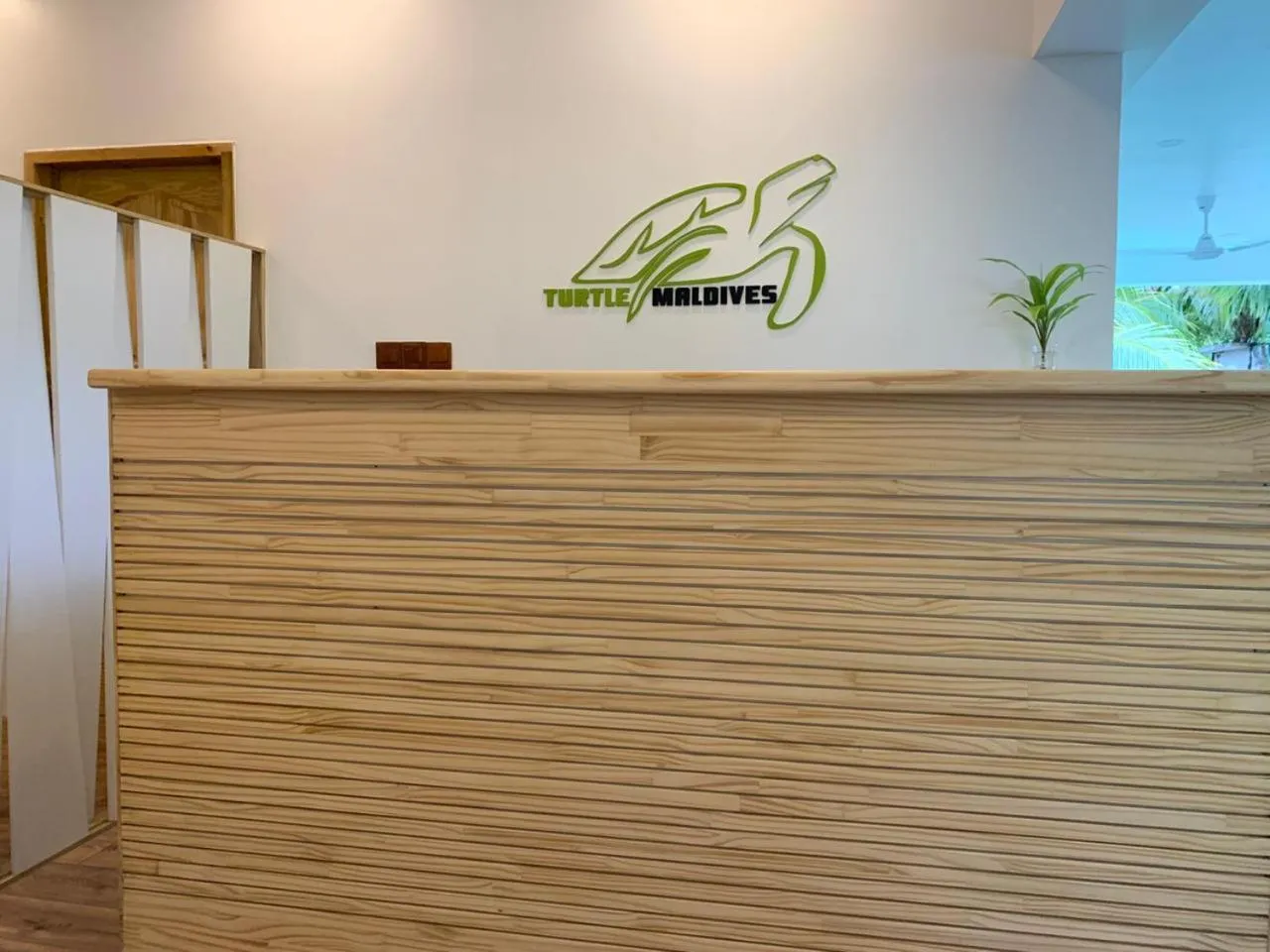 Property logo or sign in Turtle Maldives - Your Gateway to the Beach & Marine Adventures Await!