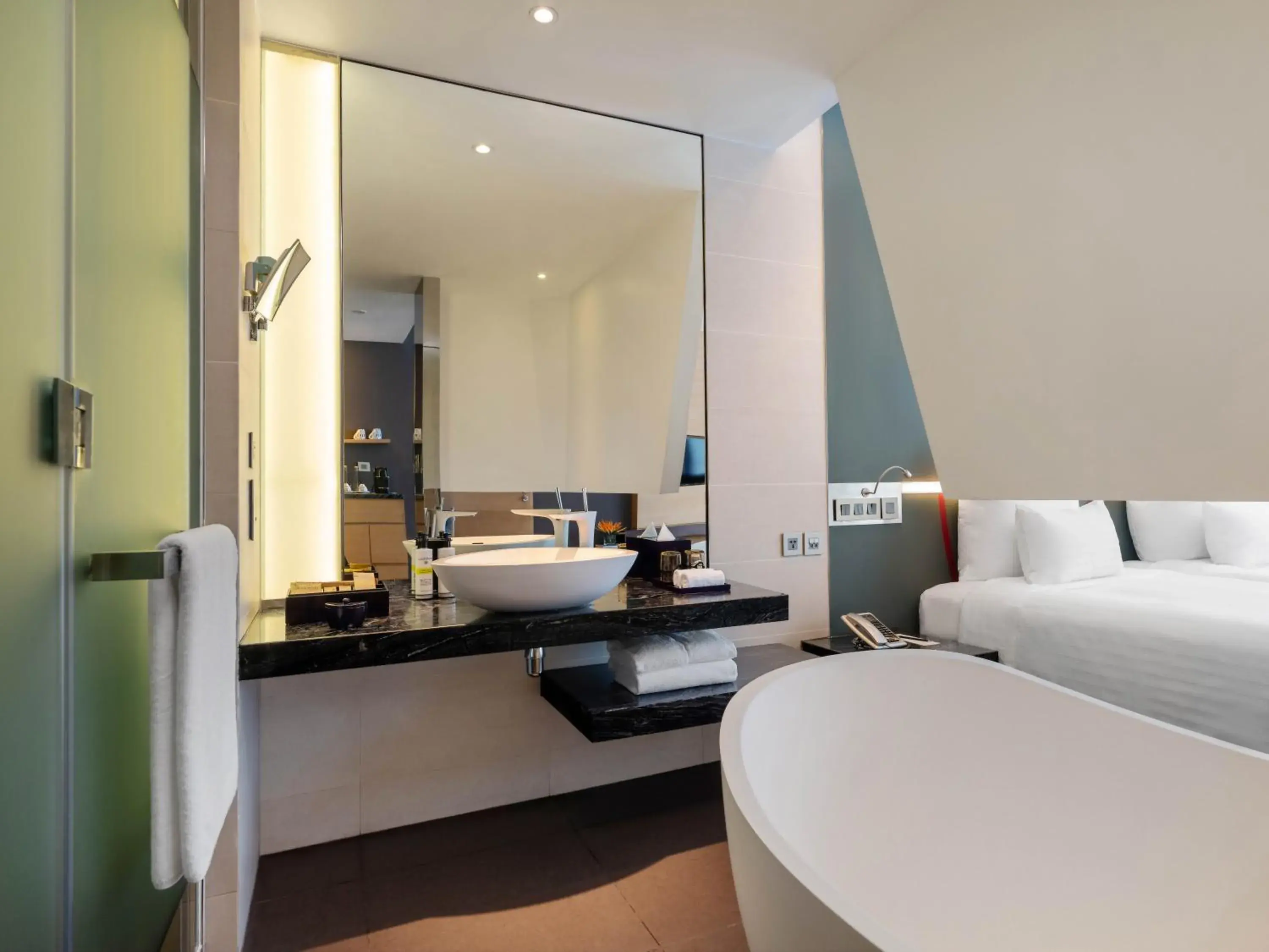 Bath, Bed in Pullman Saigon Centre Bath, Bed in Pullman Saigon Centre