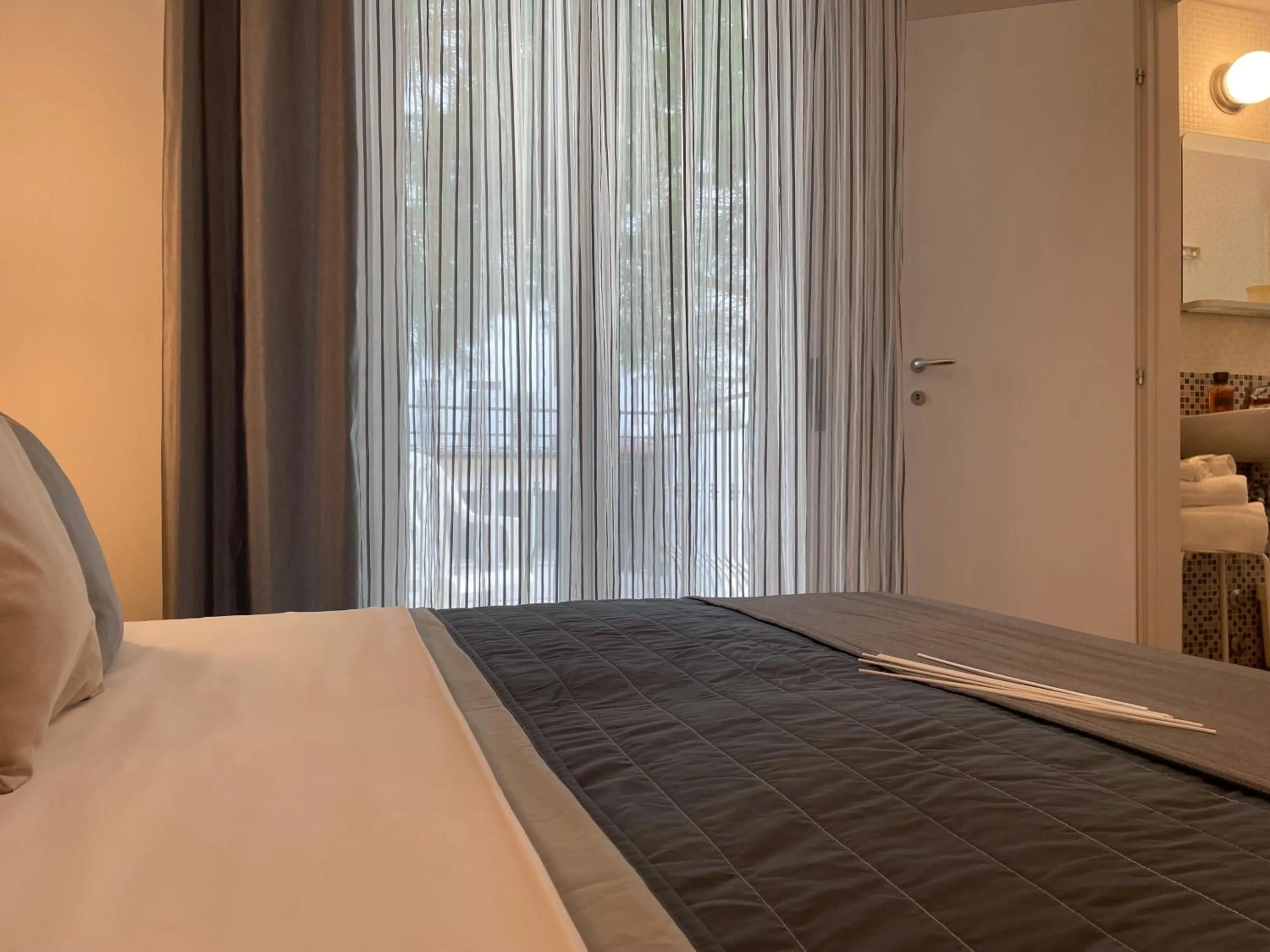 Bed in Hotel Augustus