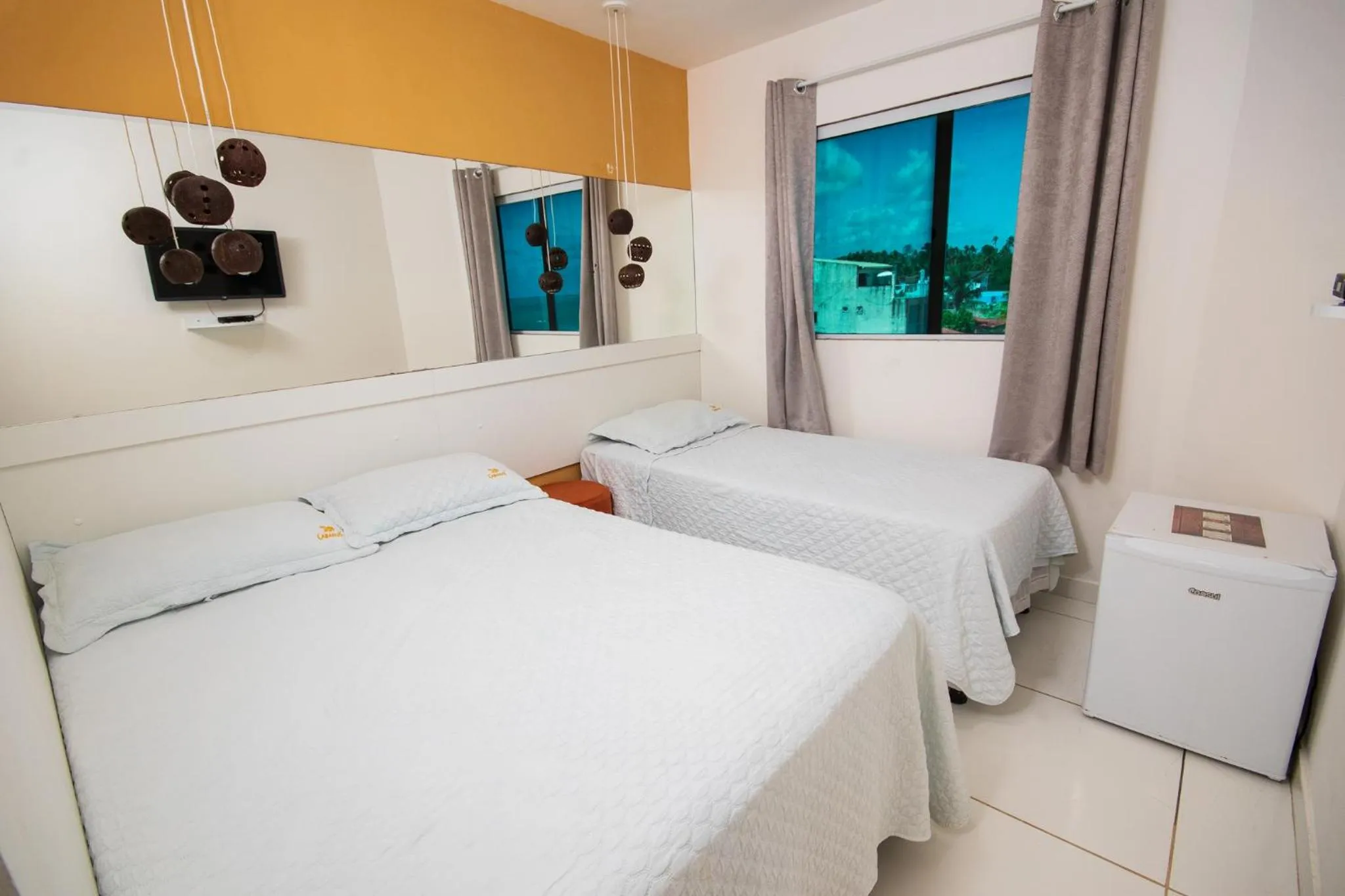 Bed in Pousada dos Cabanos