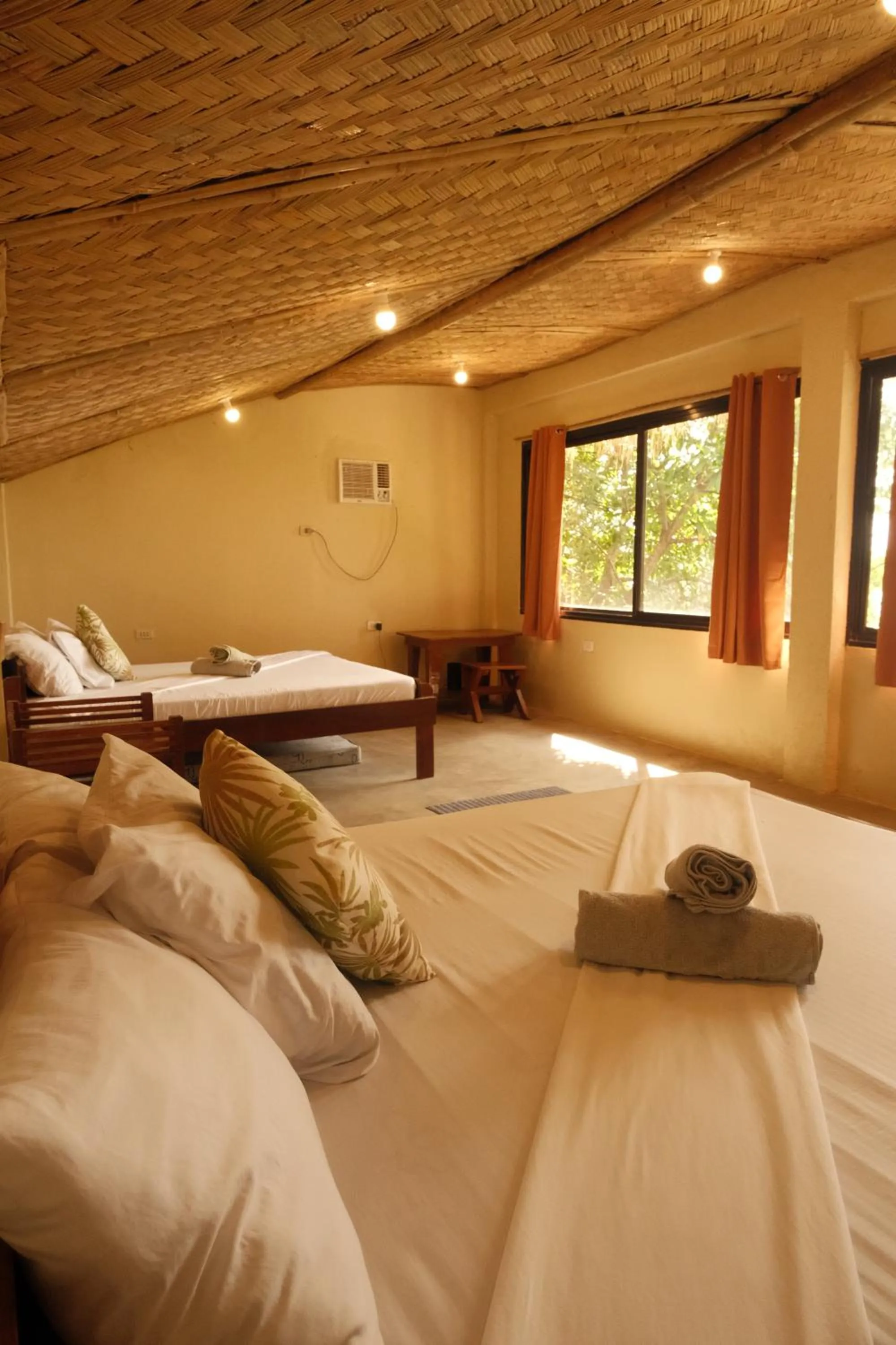 Bed in Cocovana Beach Resort