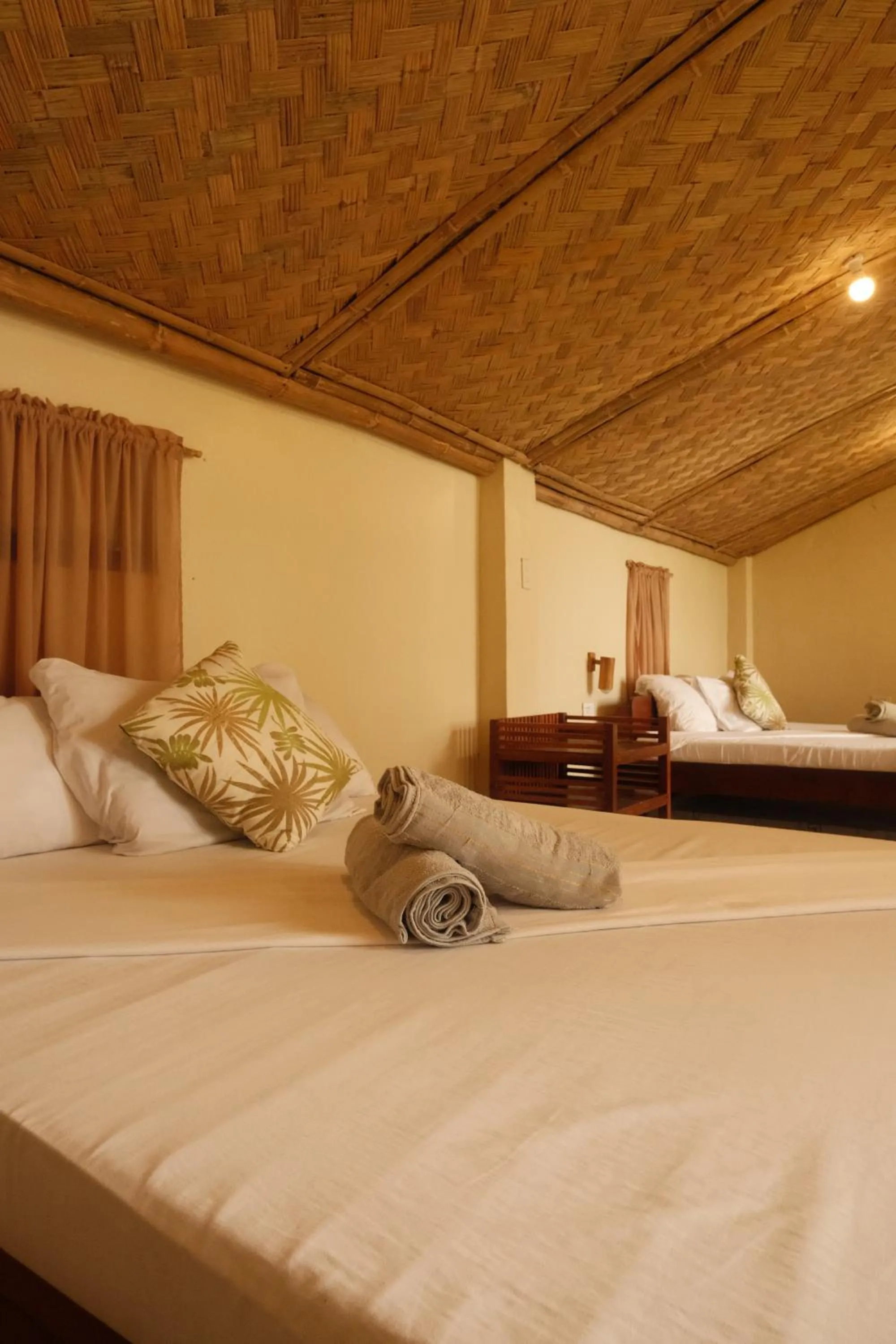 Bed in Cocovana Beach Resort