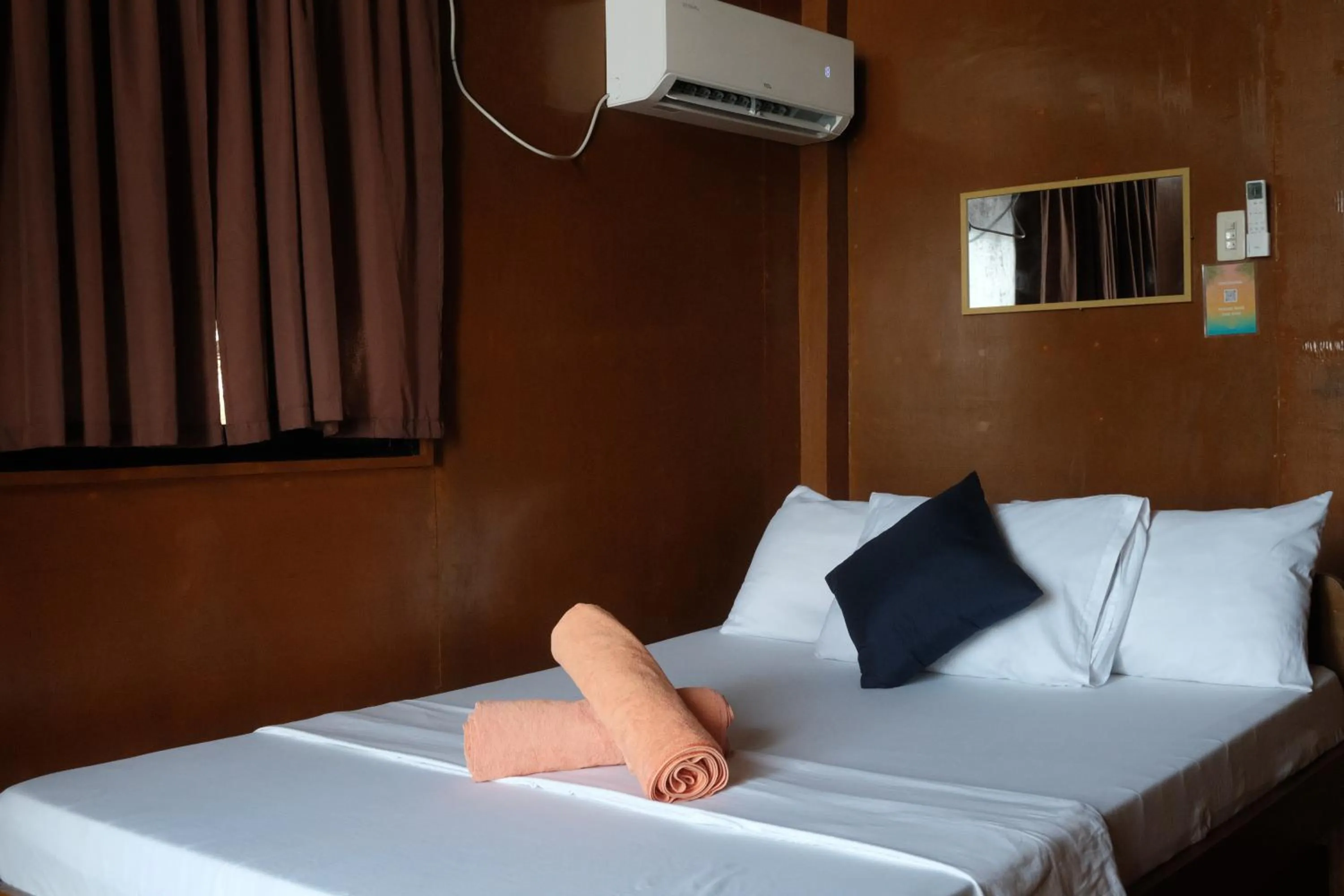 Bed in Cocovana Beach Resort