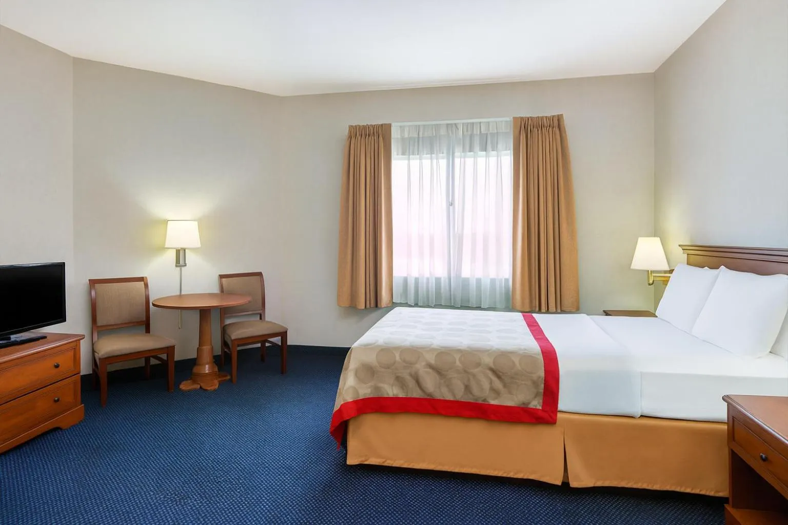 Bed in Ramada by Wyndham Hawthorne/LAX