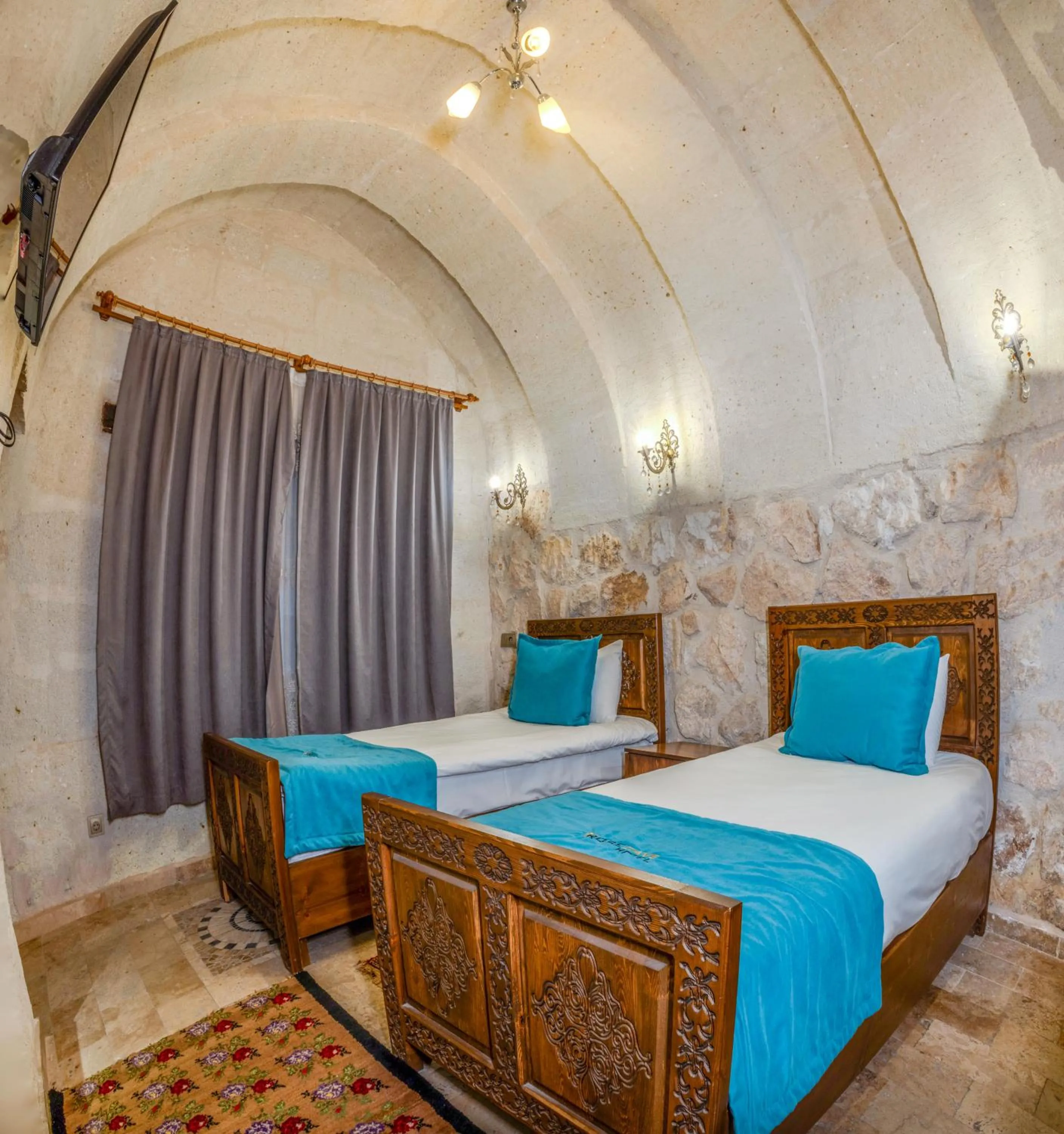 Bed in Angel Cappadocia Cave Hotel