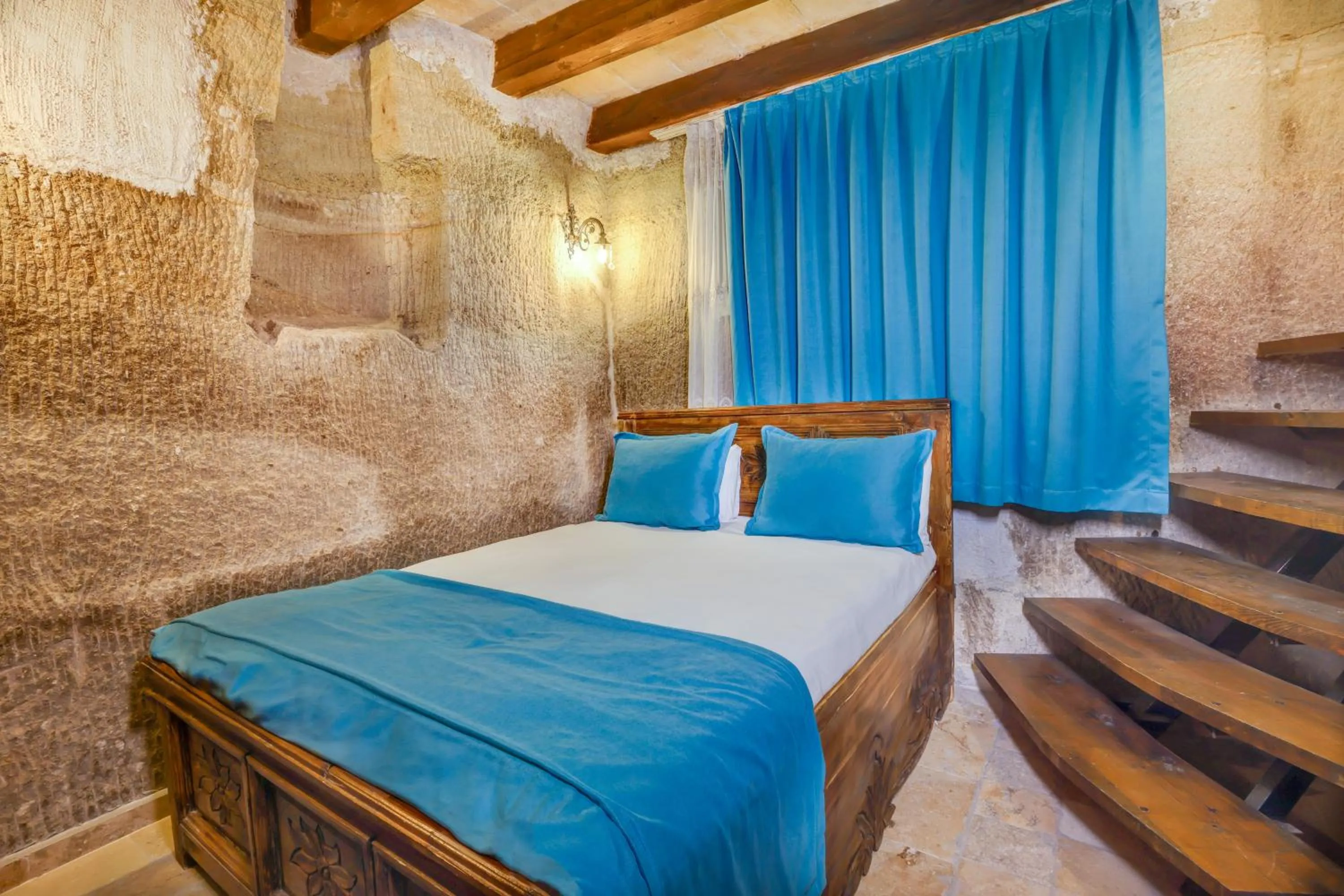 Bed in Angel Cappadocia Cave Hotel