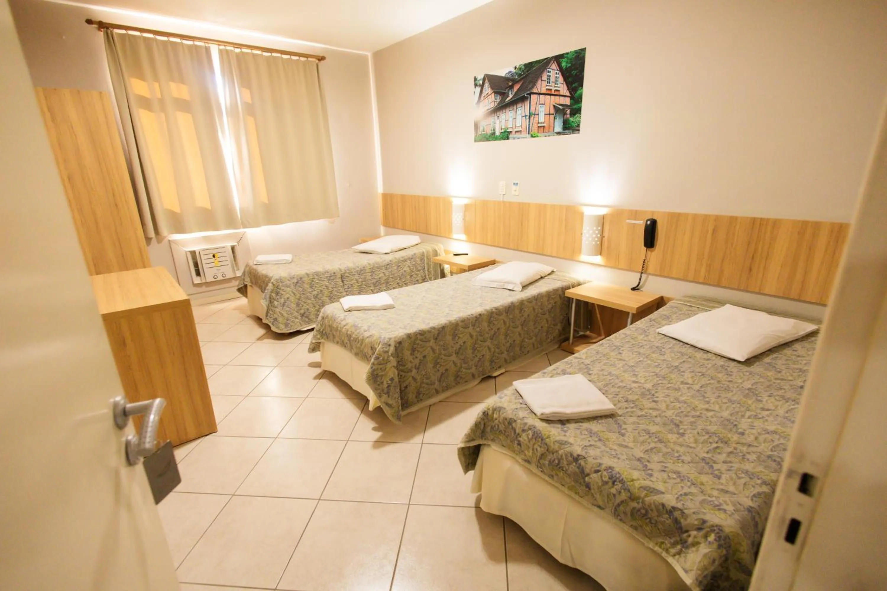 Bed in CHA Mime Hotel