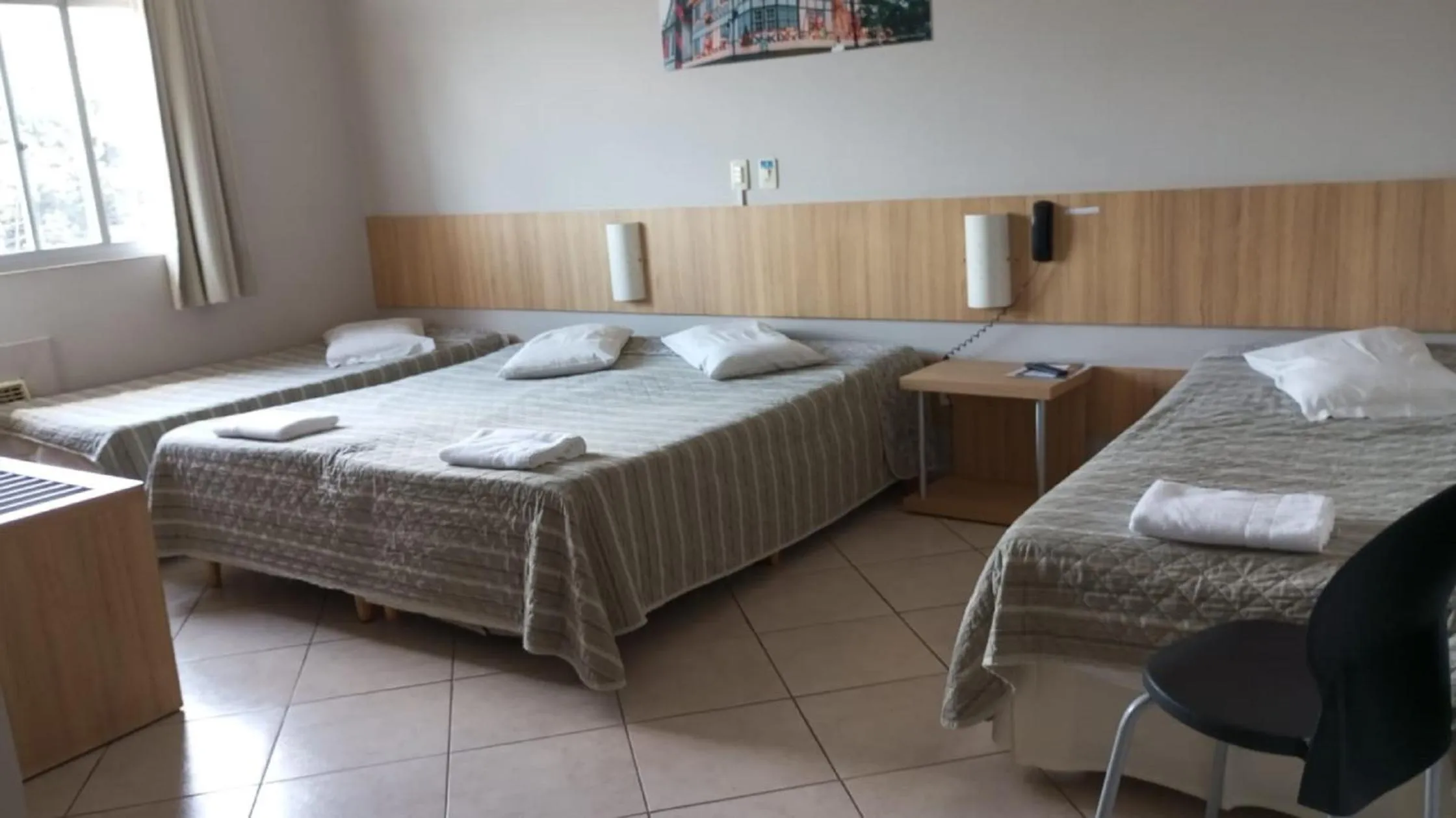 Bed in CHA Mime Hotel