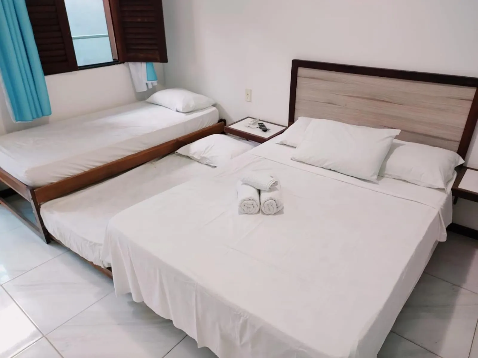 Bed in Pousada Camburi Star