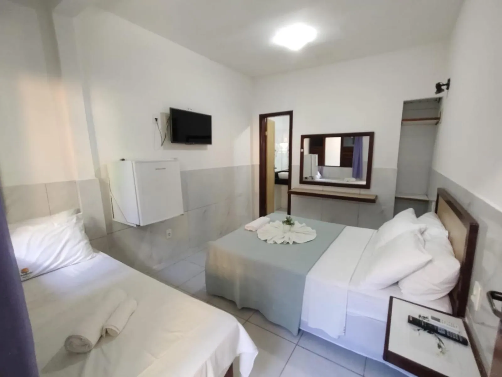 Photo of the whole room in Pousada Camburi Star