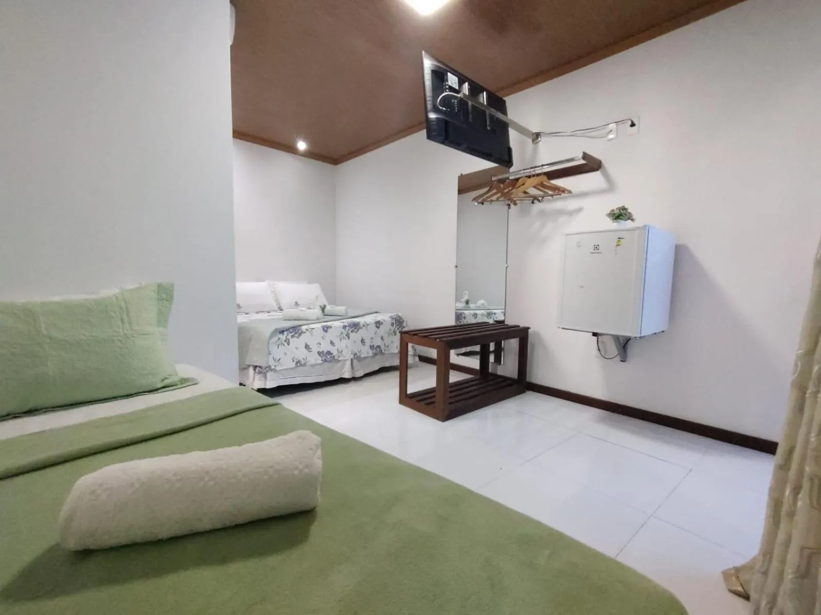 Photo of the whole room in Pousada Camburi Star