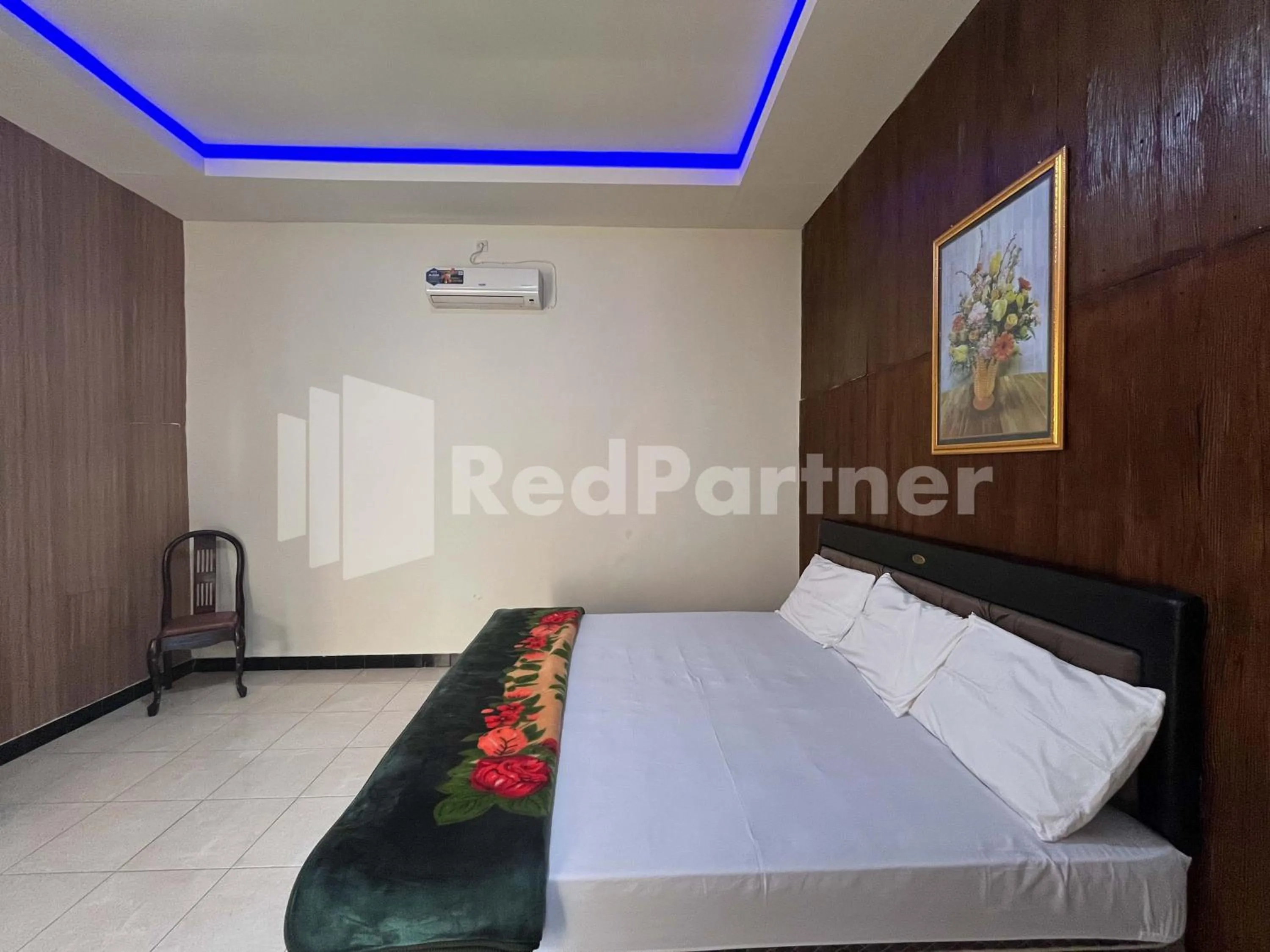 Bedroom, Bed in Hotel Dewi near GOR Merdeka Jombang Mitra RedDoorz