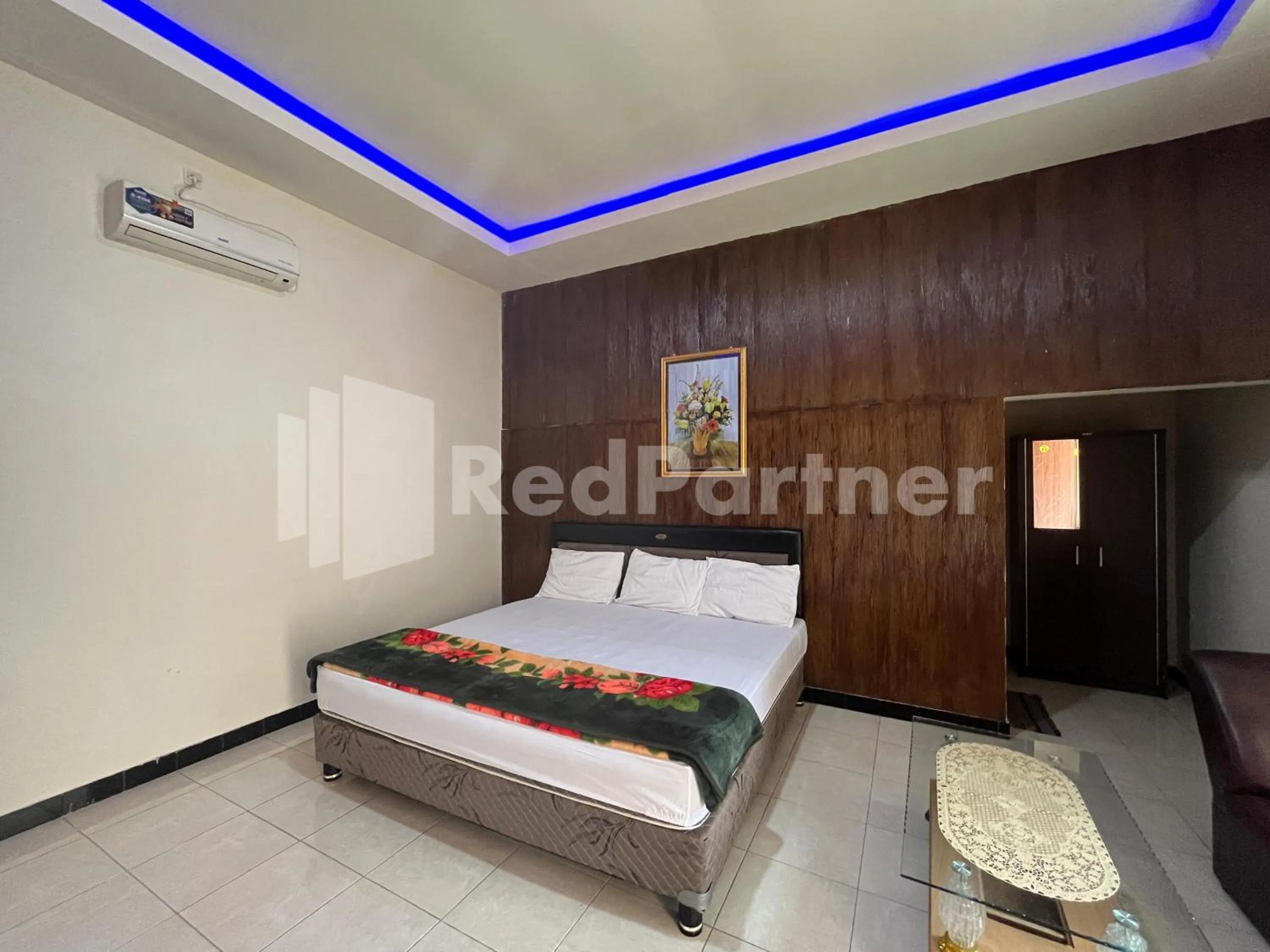 Bedroom, Bed in Hotel Dewi near GOR Merdeka Jombang Mitra RedDoorz