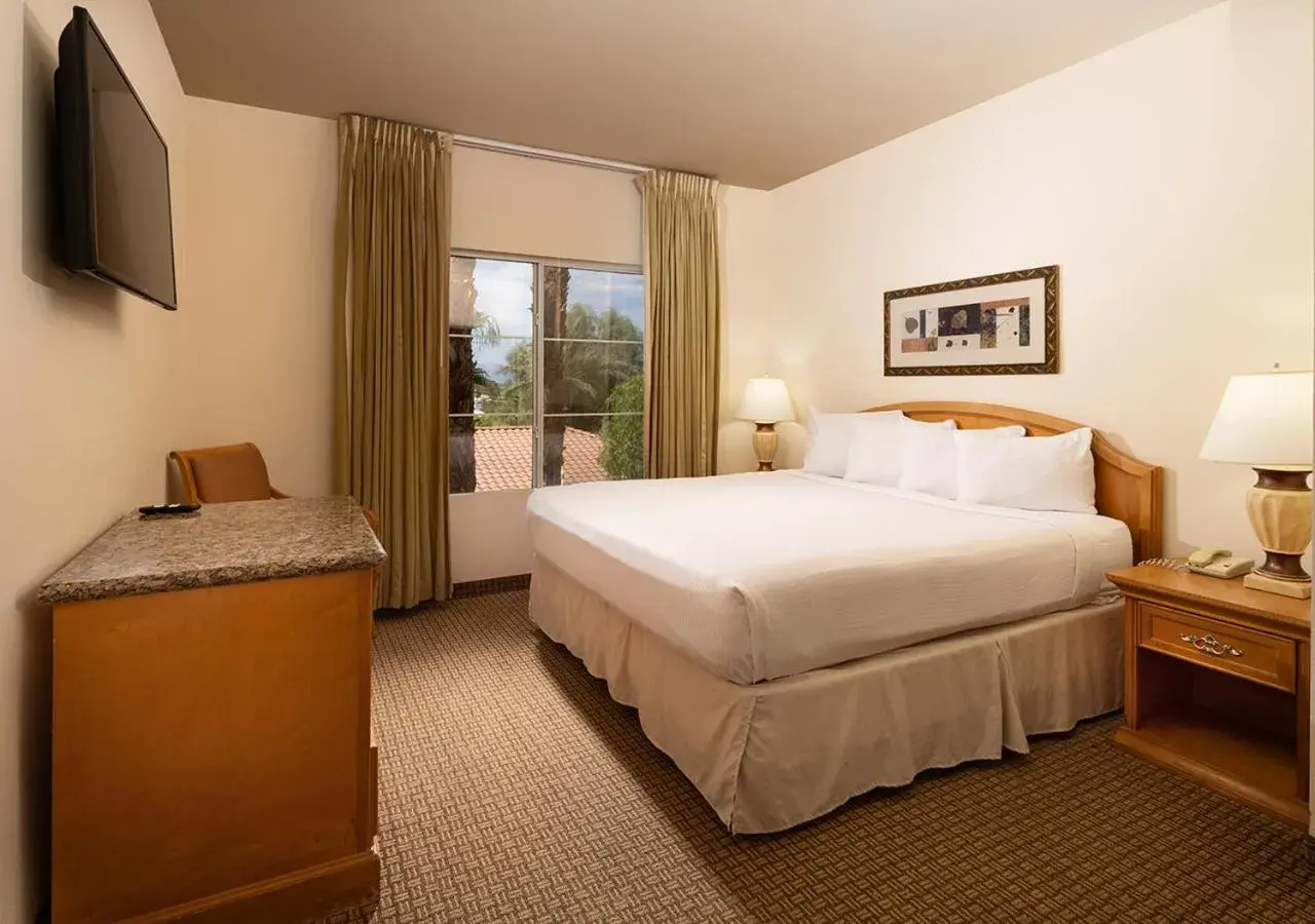 Bed in Club de Soleil All-Suite Resort Bed in Club de Soleil All-Suite Resort