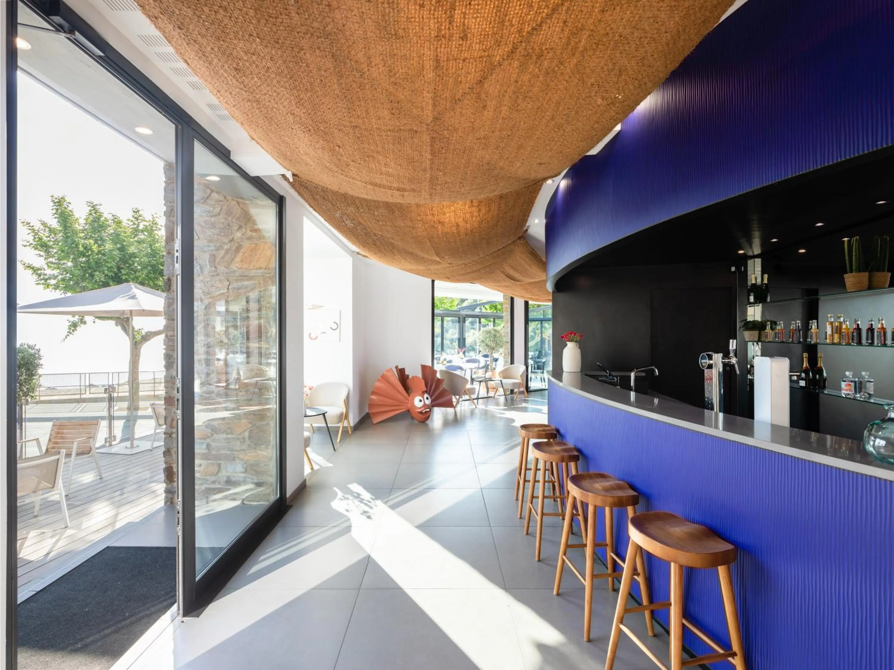 Lounge or bar in Les Elmes - Hôtel & Spa