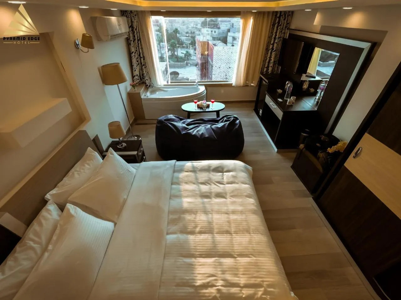 Photo of the whole room in Pyramid Edge Hotel & Exclusive Pyramids View Rooftop