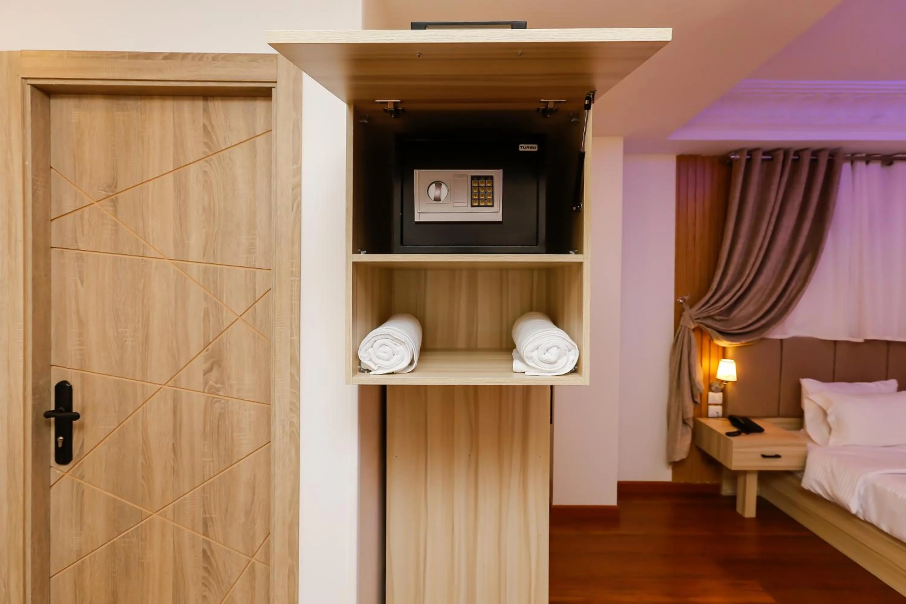 wardrobe, Bed in Pyramid Edge Hotel & Exclusive Pyramids View Rooftop