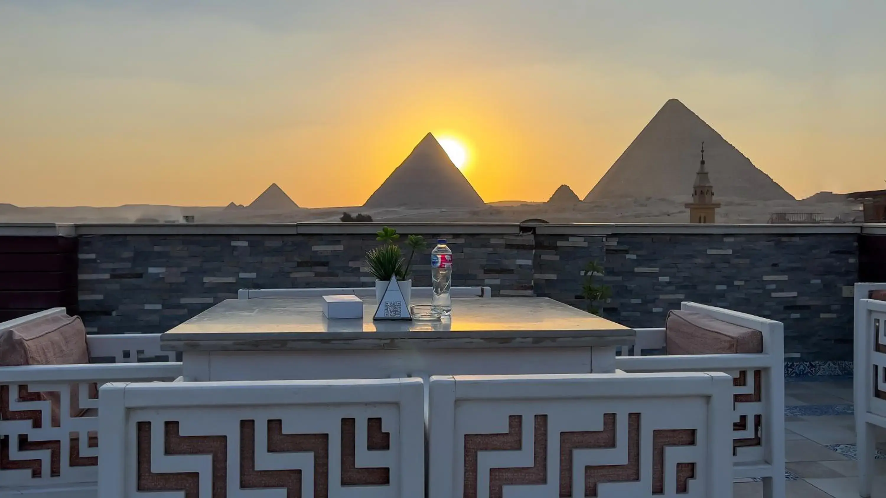 Sunset in Pyramid Edge Hotel & Exclusive Pyramids View Rooftop Sunset in Pyramid Edge Hotel & Exclusive Pyramids View Rooftop