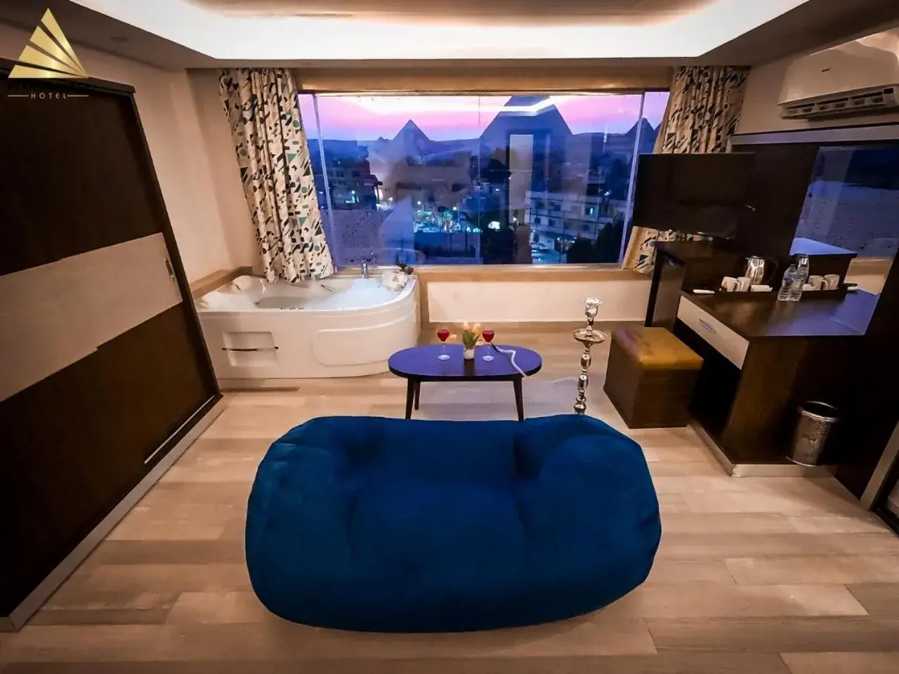 Photo of the whole room in Pyramid Edge Hotel & Exclusive Pyramids View Rooftop Photo of the whole room in Pyramid Edge Hotel & Exclusive Pyramids View Rooftop