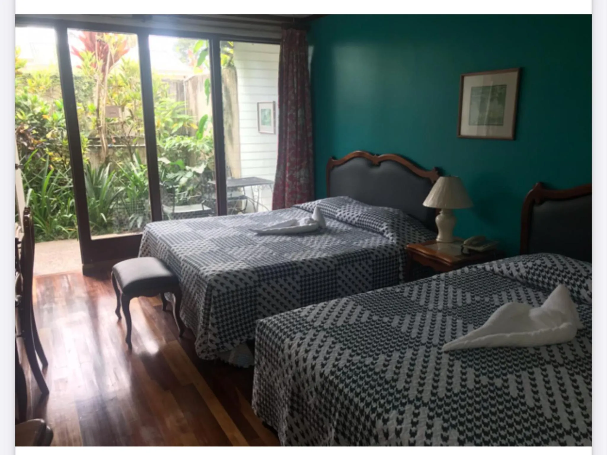 Bed in La Bergerac Boutique Hotel