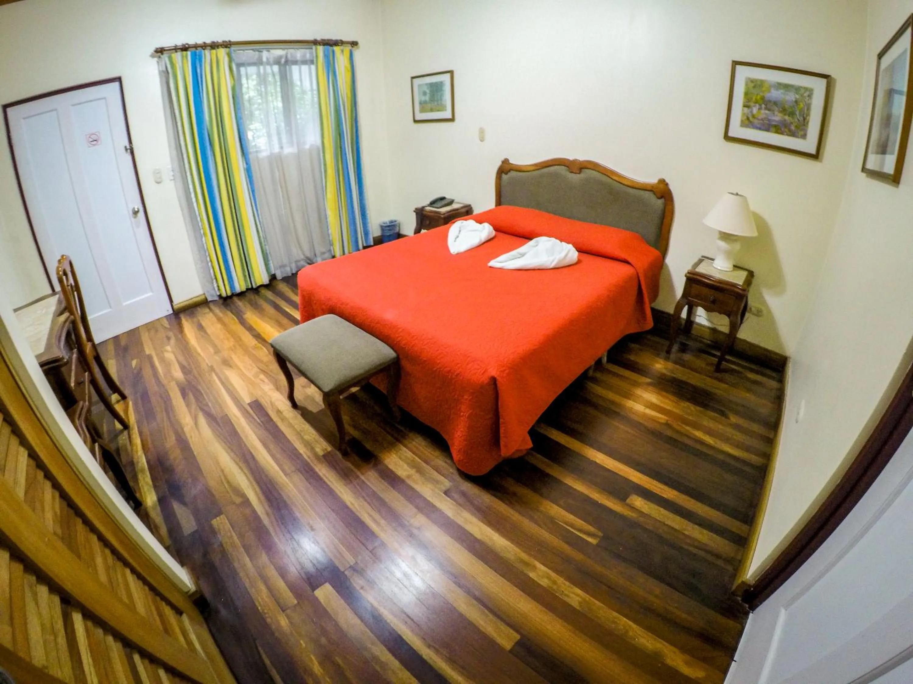 Bed in La Bergerac Boutique Hotel