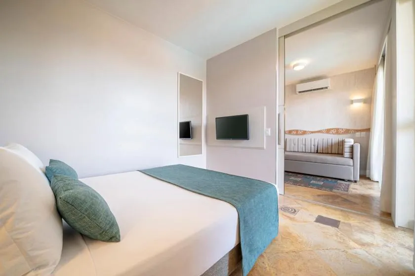 Bedroom, Bed in Beach Park Resort - Suites