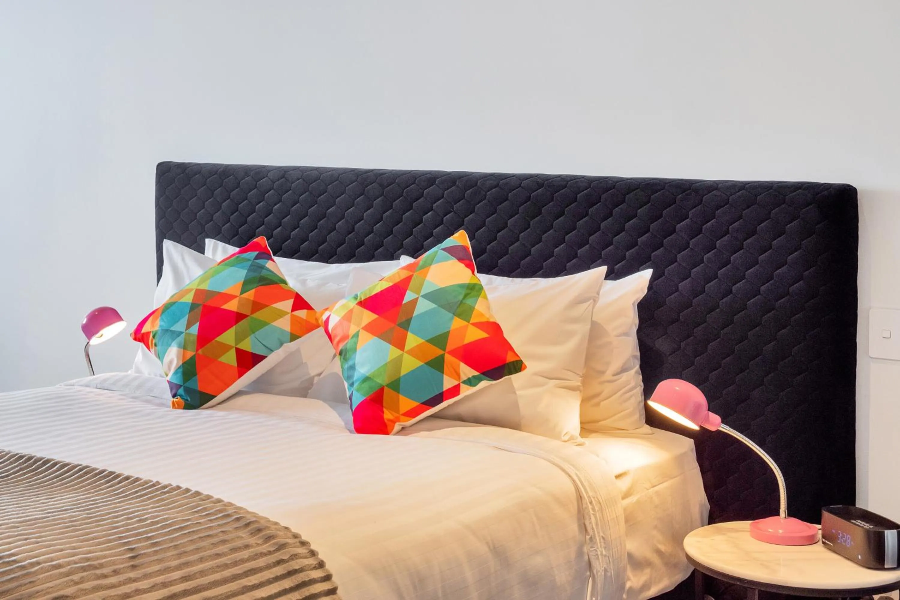 Bed in Roomie Apartment Hotel