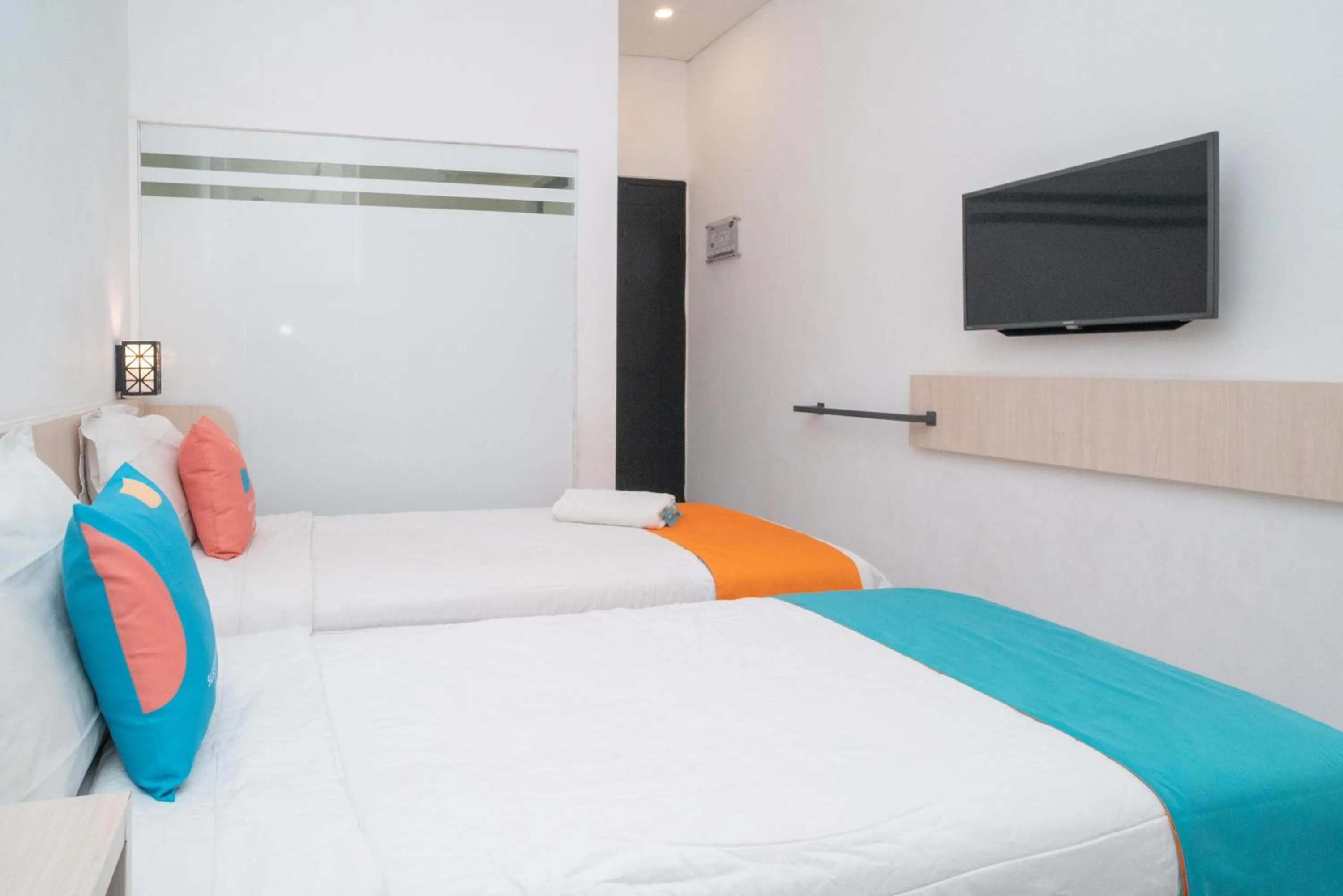 Bedroom, Bed in Sans Hotel FiFFa Premiere Malang