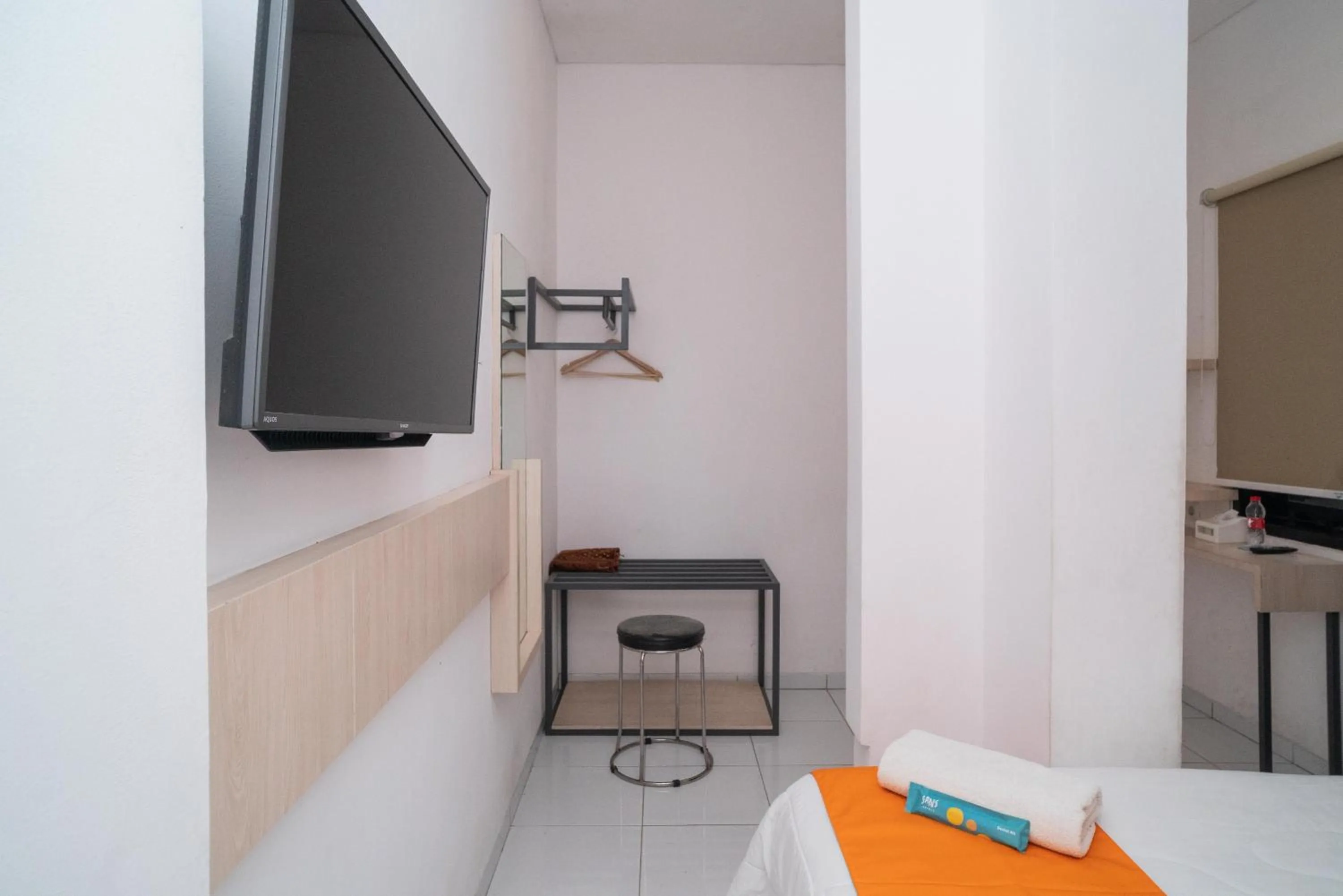 Bedroom in Sans Hotel FiFFa Premiere Malang