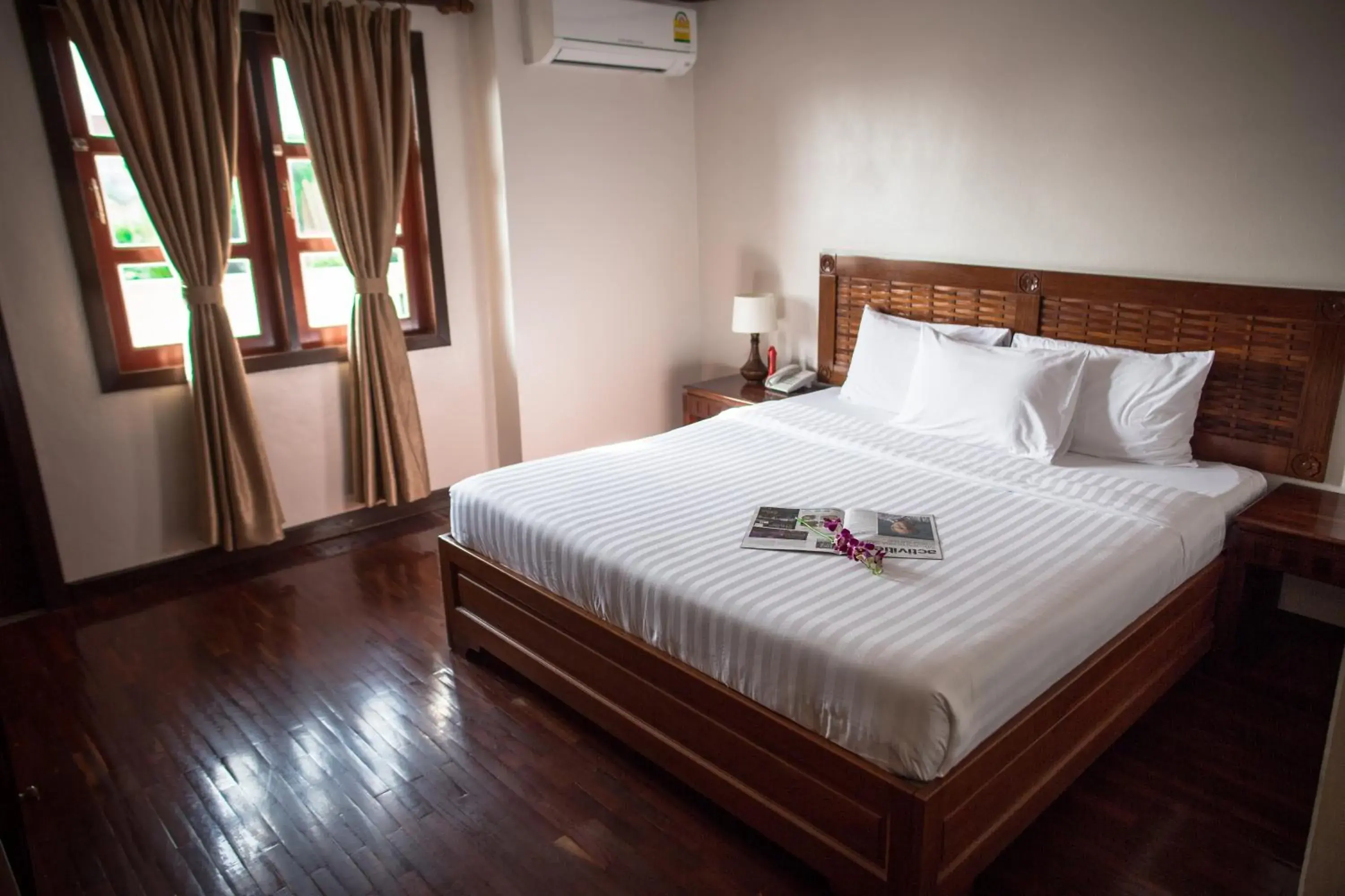 Bed in Lao Orchid Hotel Bed in Lao Orchid Hotel