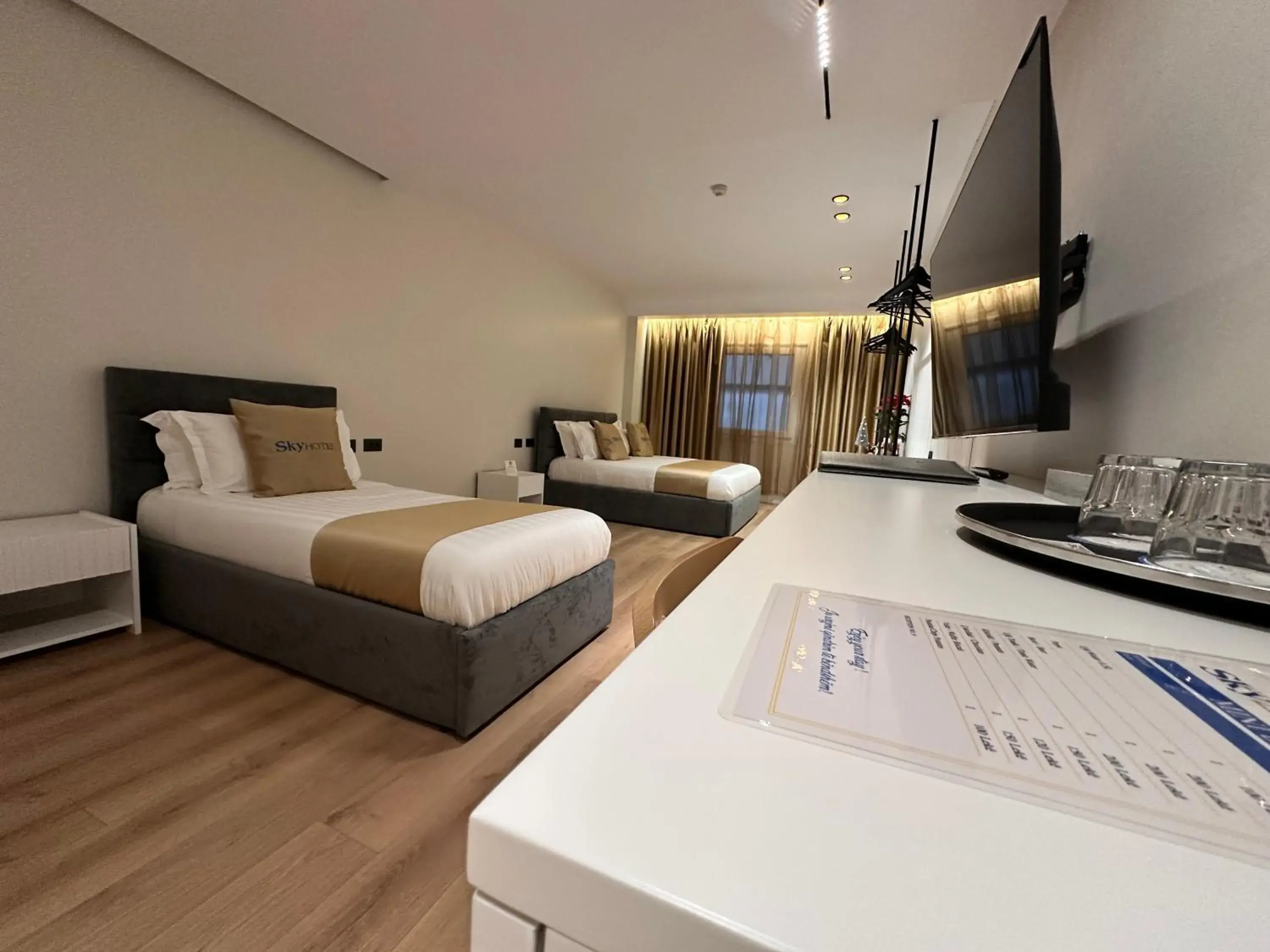 Communal lounge/ TV room, Bed in Sky 2 Hotel Tirana Communal lounge/ TV room, Bed in Sky 2 Hotel Tirana