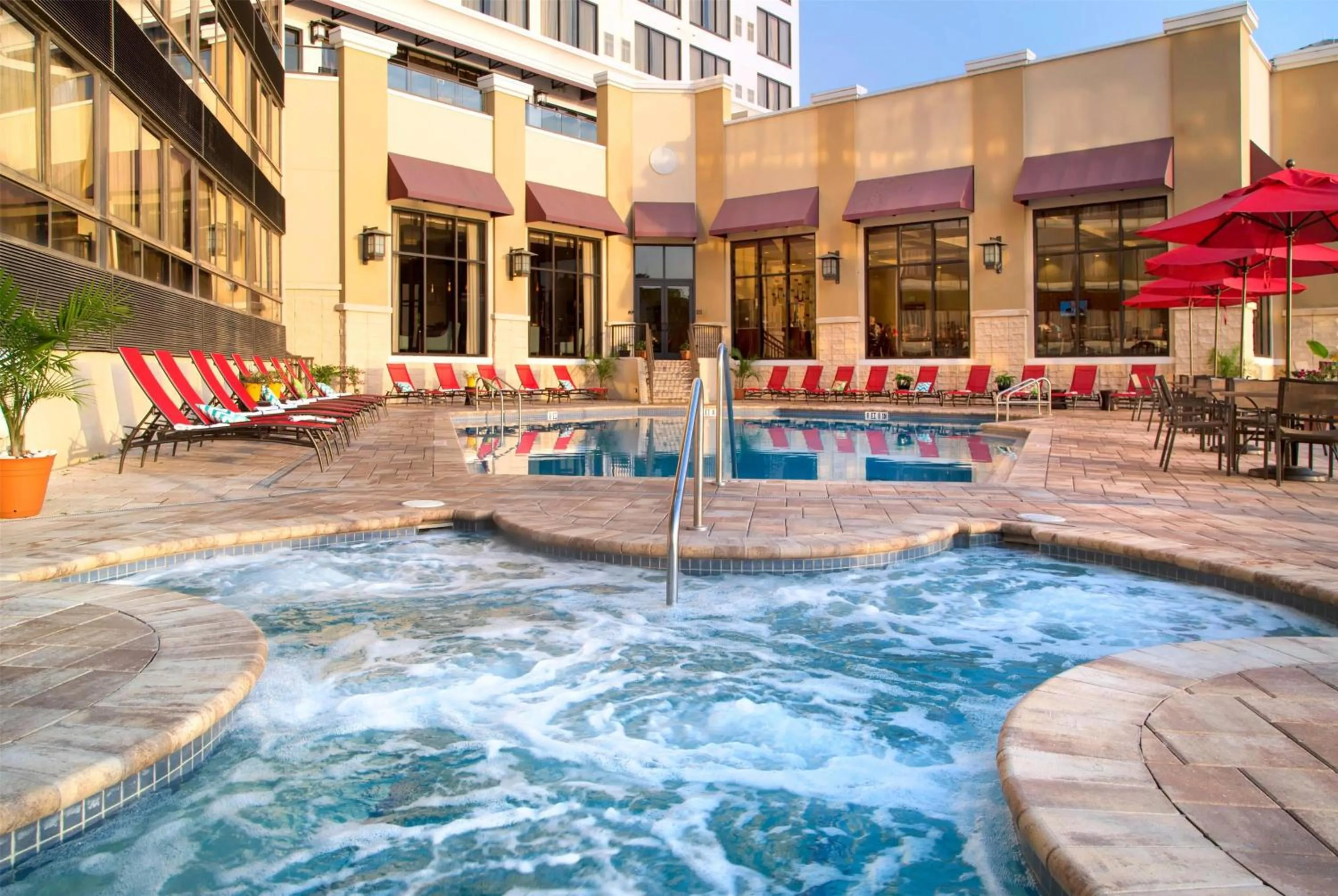 Pool view in Ramada Plaza by Wyndham Orlando Resort & Suites Intl Drive - Newly Renovated!