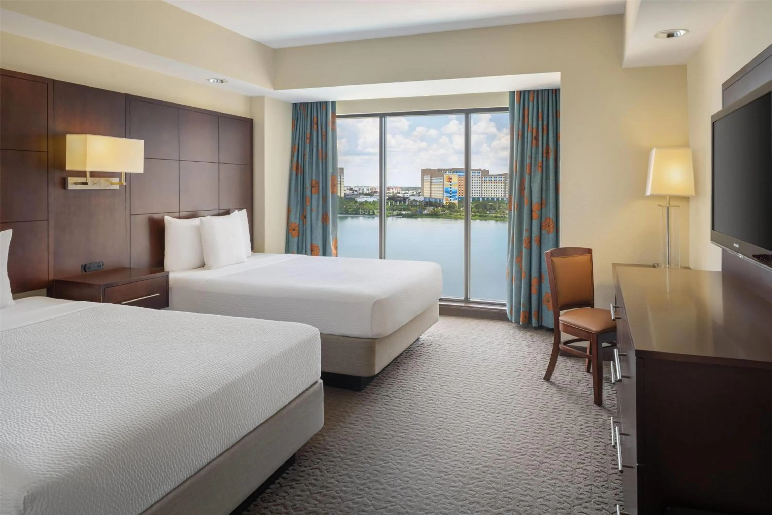 Photo of the whole room, Bed in Ramada Plaza by Wyndham Orlando Resort & Suites Intl Drive - Newly Renovated!