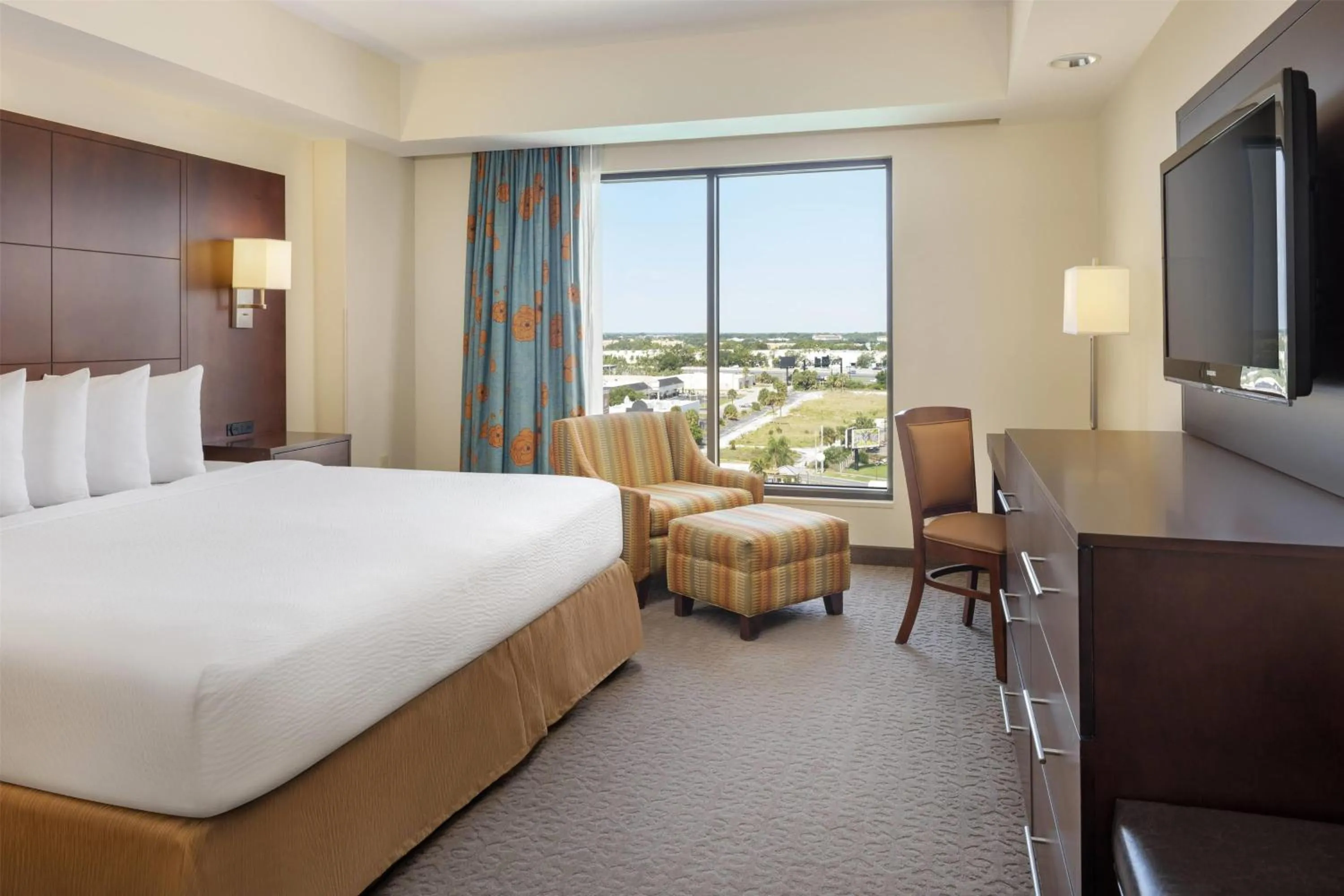 Photo of the whole room, Bed in Ramada Plaza by Wyndham Orlando Resort & Suites Intl Drive - Newly Renovated!
