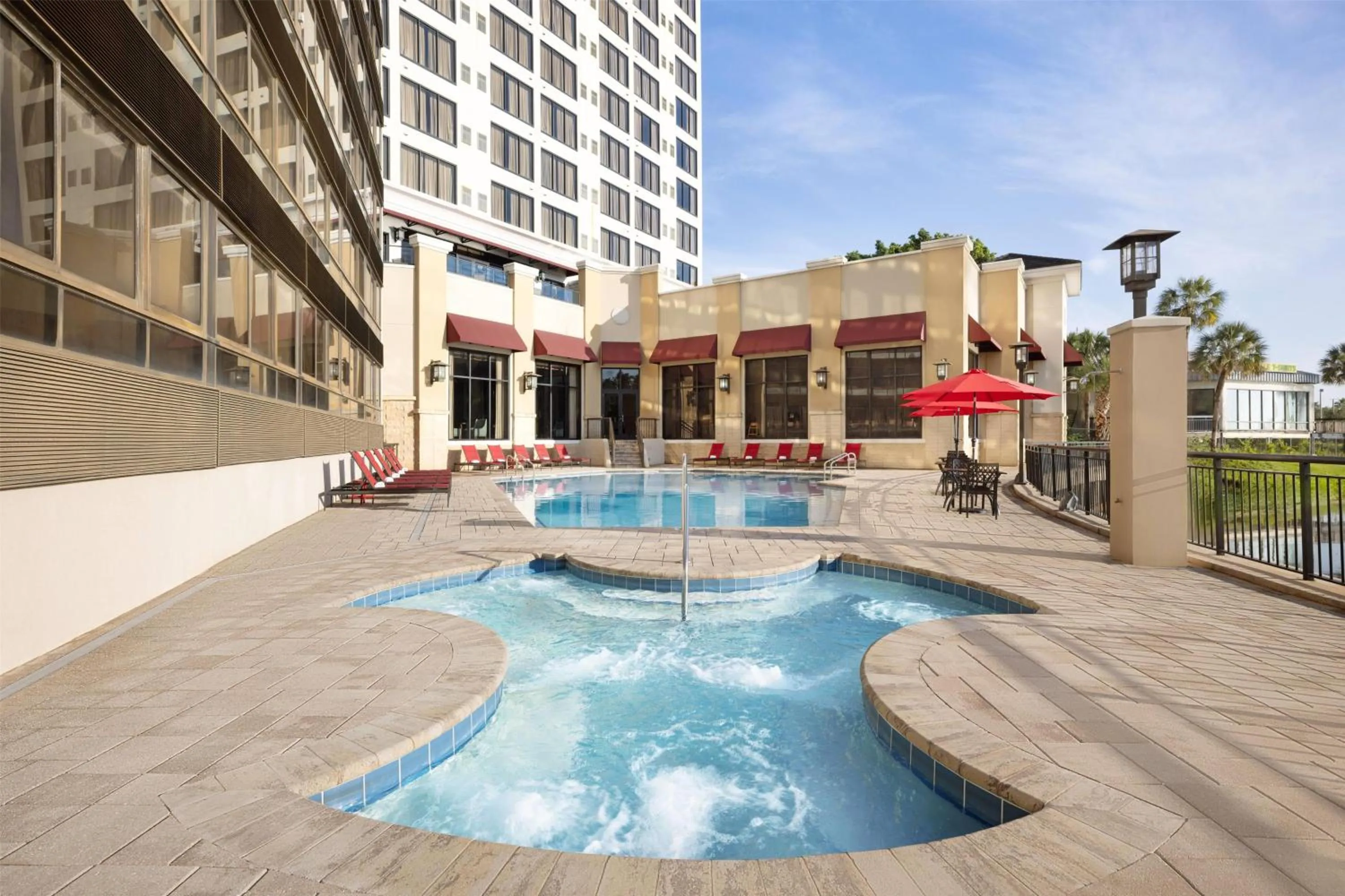 Pool view in Ramada Plaza by Wyndham Orlando Resort & Suites Intl Drive - Newly Renovated!