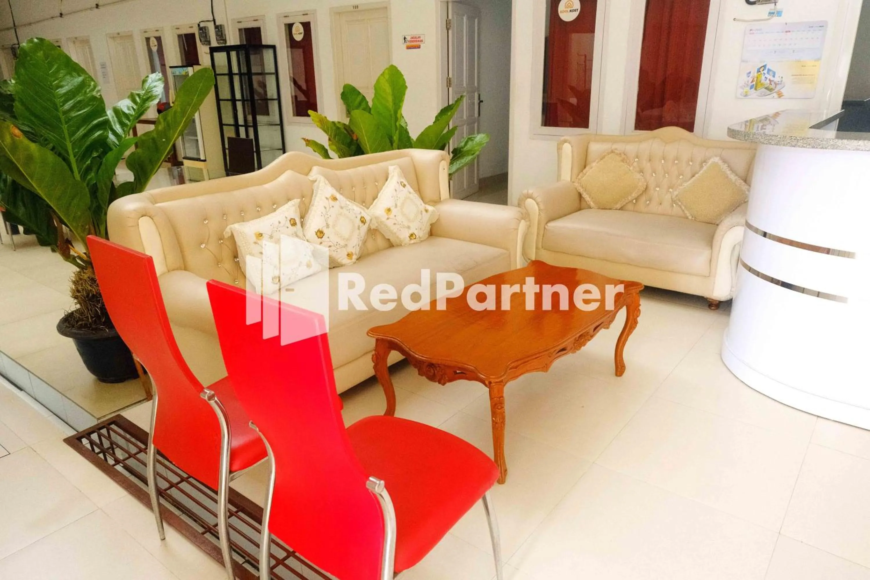 Living room in Fortuner Homestay Syariah Makassar Mitra RedDoorz