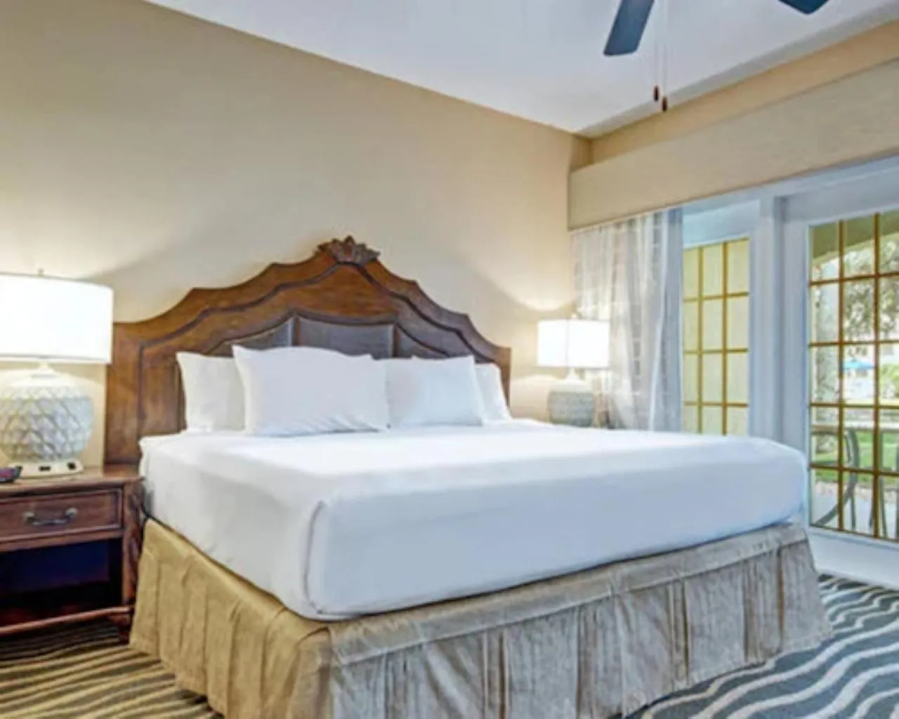 Bedroom, Bed in Summer Bay Orlando by Exploria Resorts