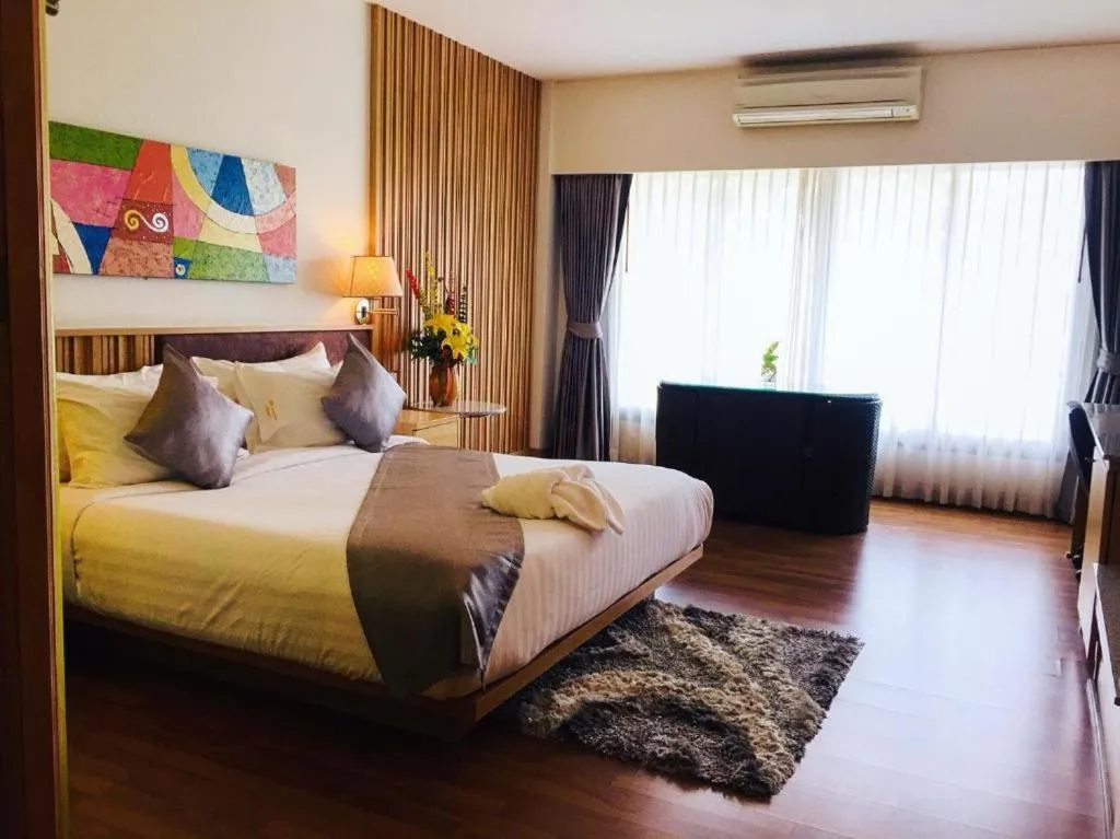 Bed in Mamaison Hotel