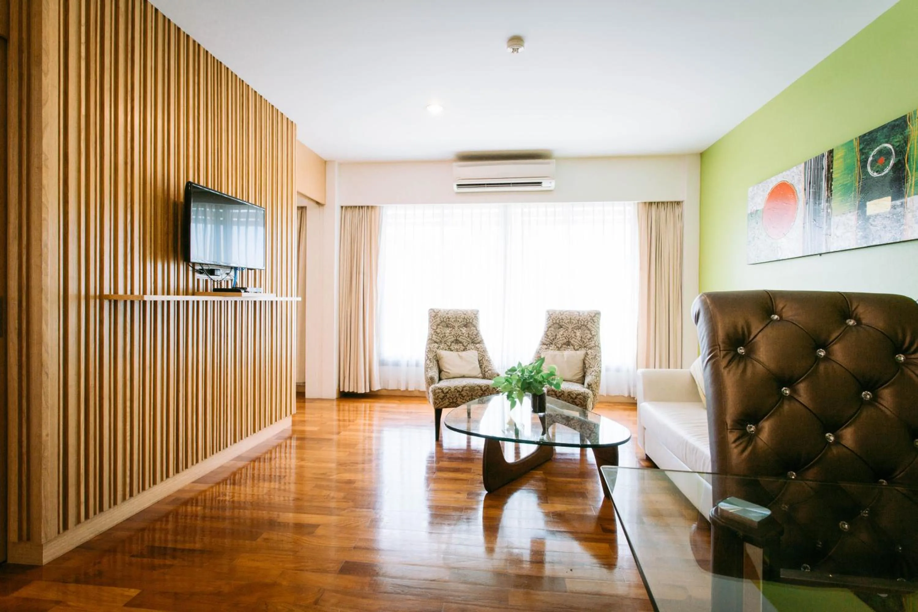 Communal lounge/ TV room in Mamaison Hotel