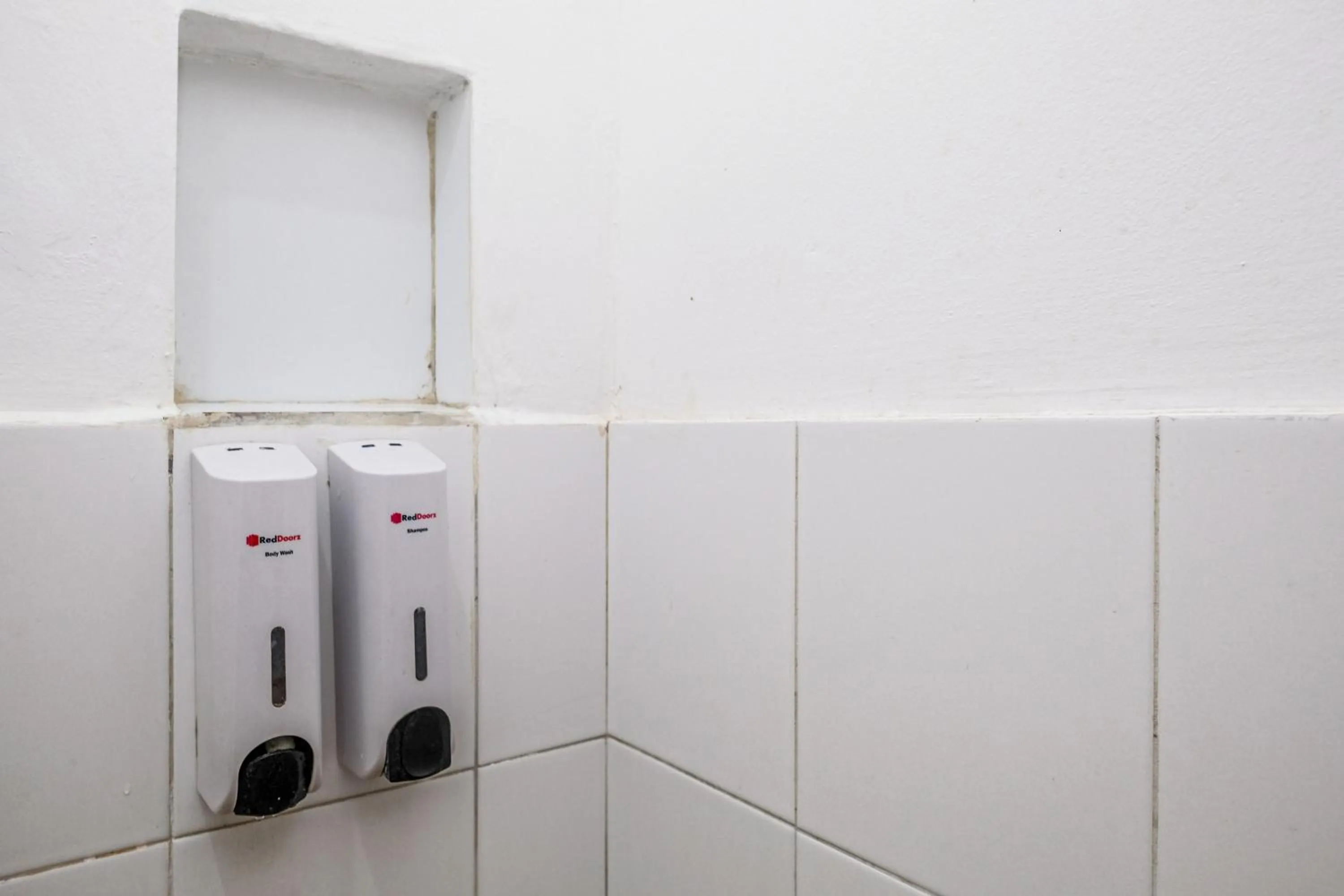 Bathroom in RedDoorz near GOR Satria 3