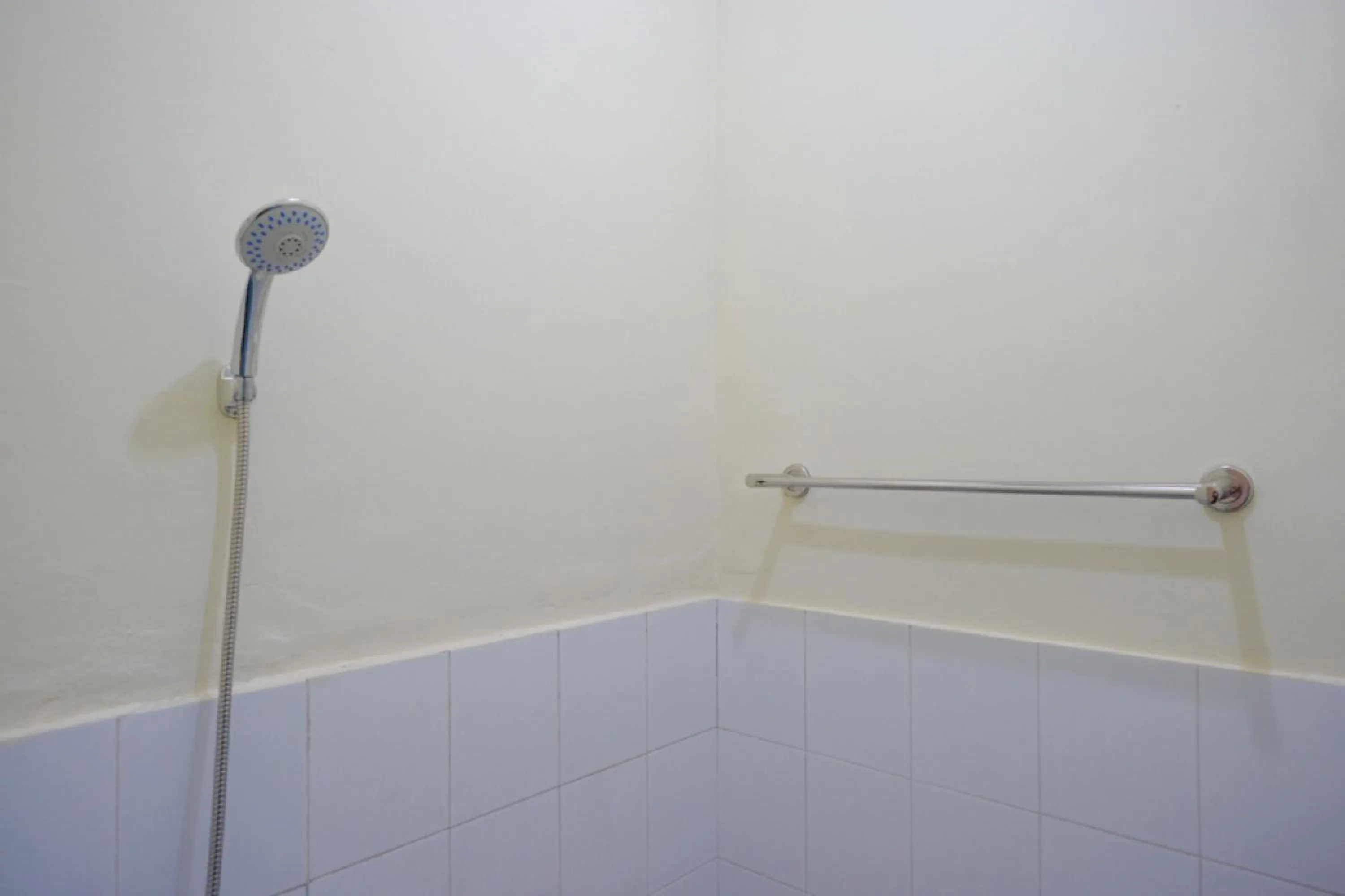 Bathroom in RedDoorz near GOR Satria 3