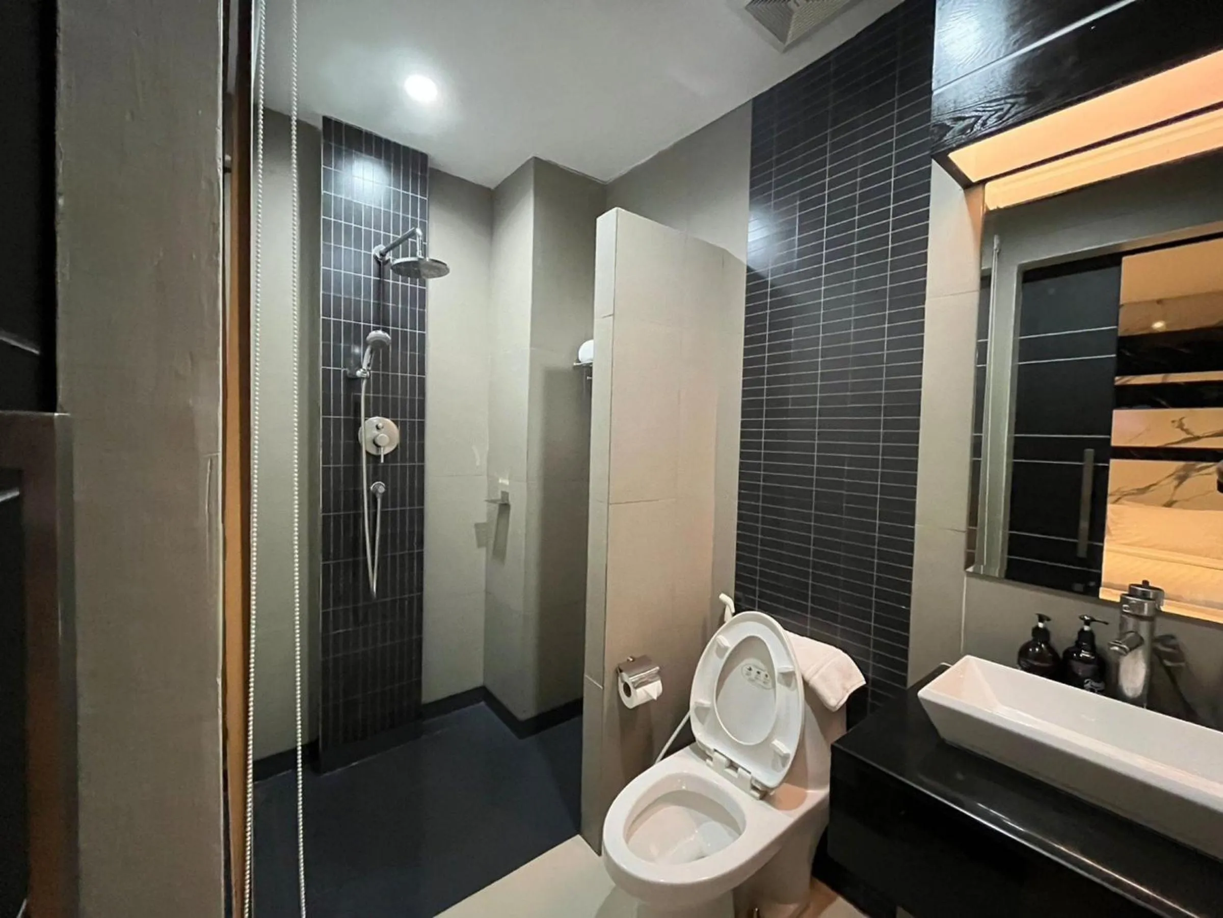 Bathroom in Sky dome resotel - โรงแรมสกายโดม รีโซเทล