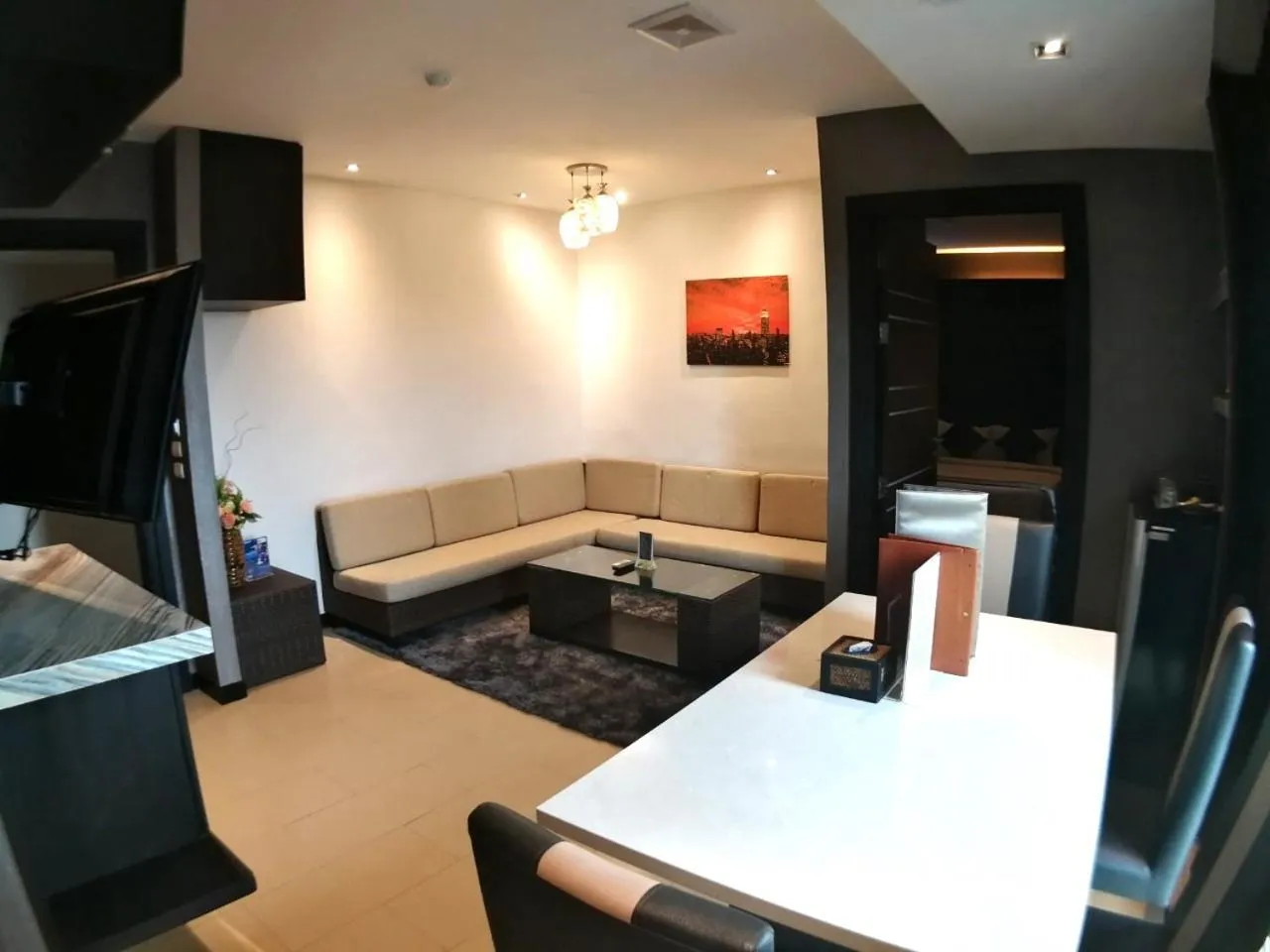 Living room in Sky dome resotel - โรงแรมสกายโดม รีโซเทล