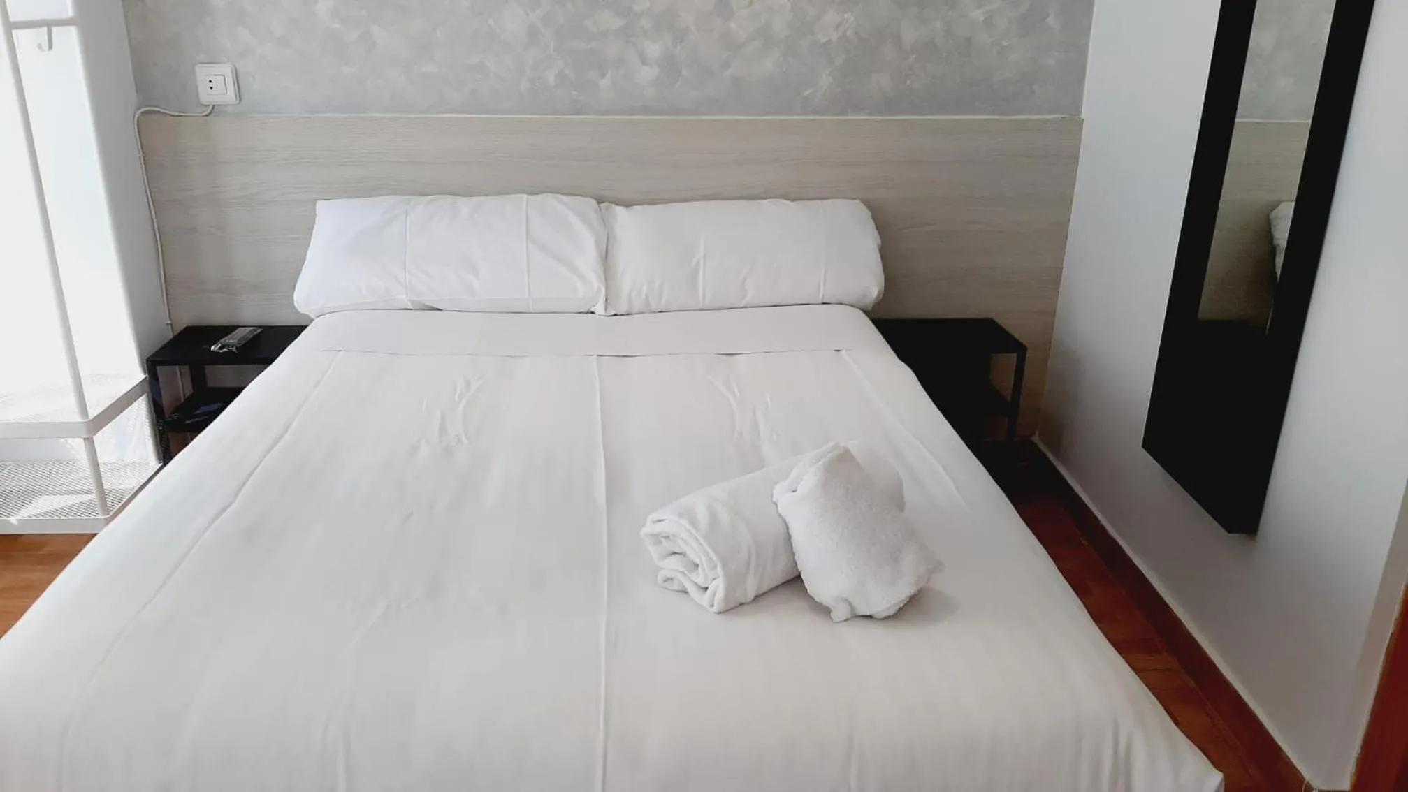 Bed in Hostal Lucia by gaiarooms