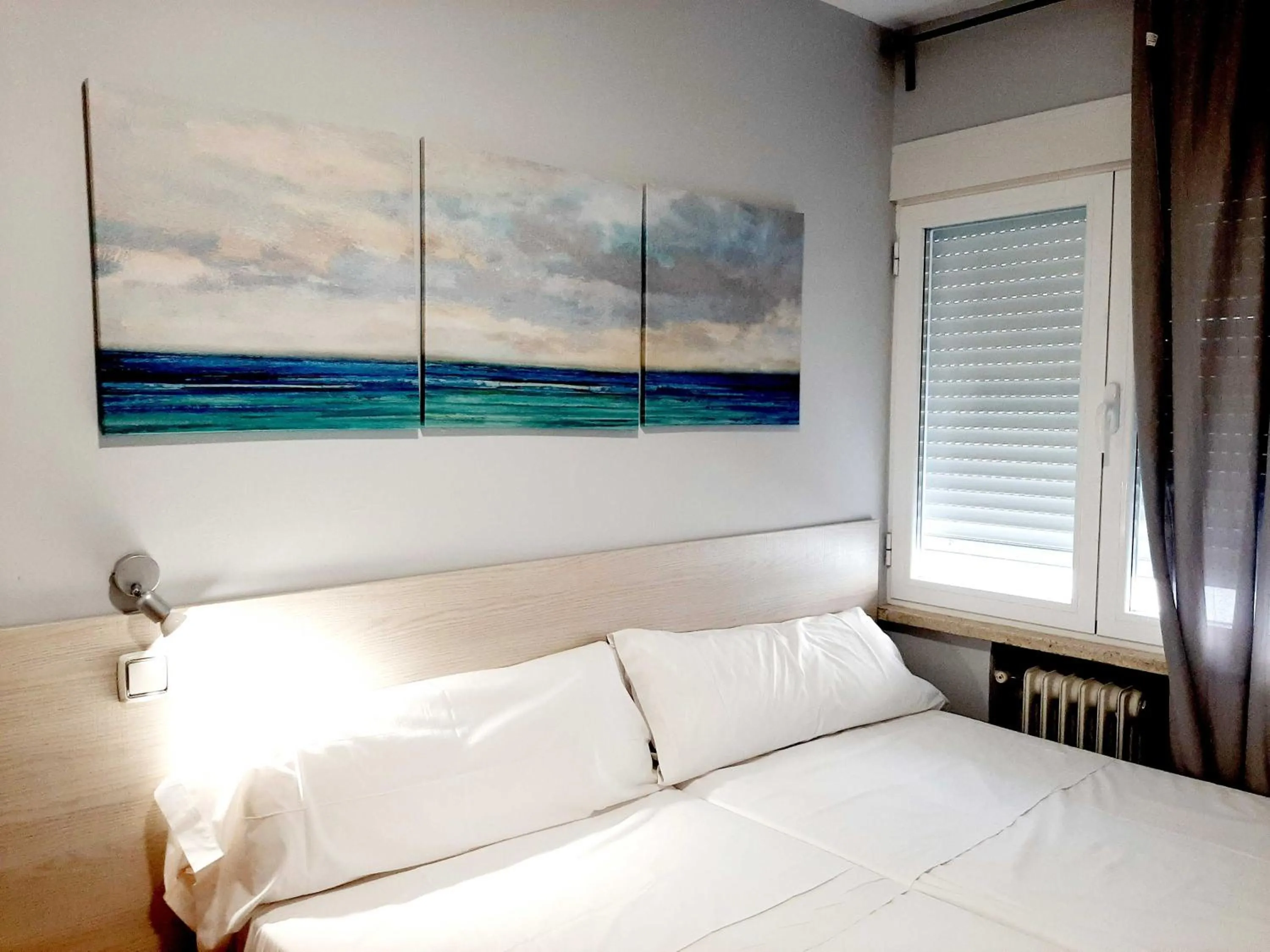 Bed in Hostal Lucia by gaiarooms