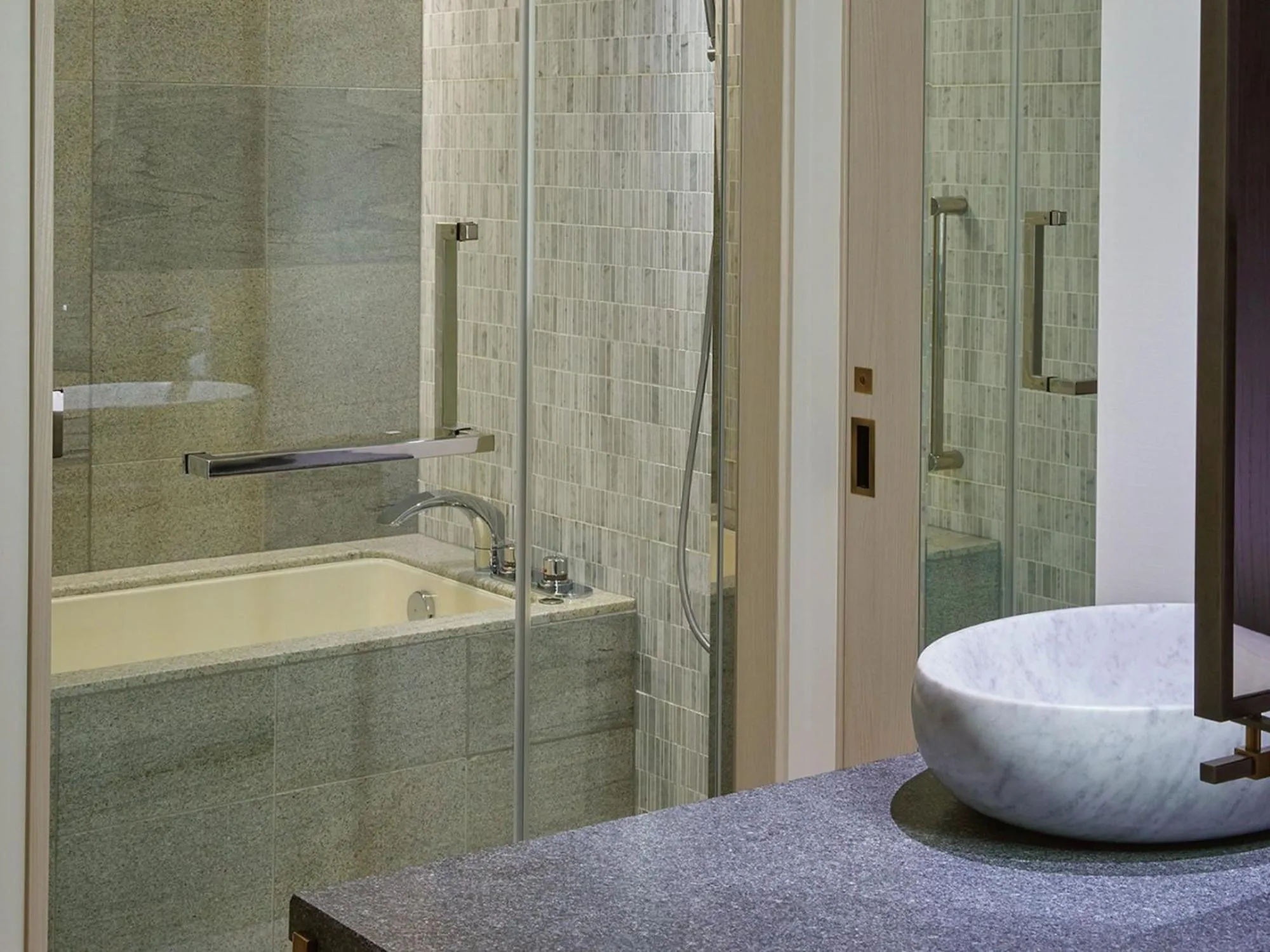 Bathroom in Kimpton Shinjuku Tokyo by IHG