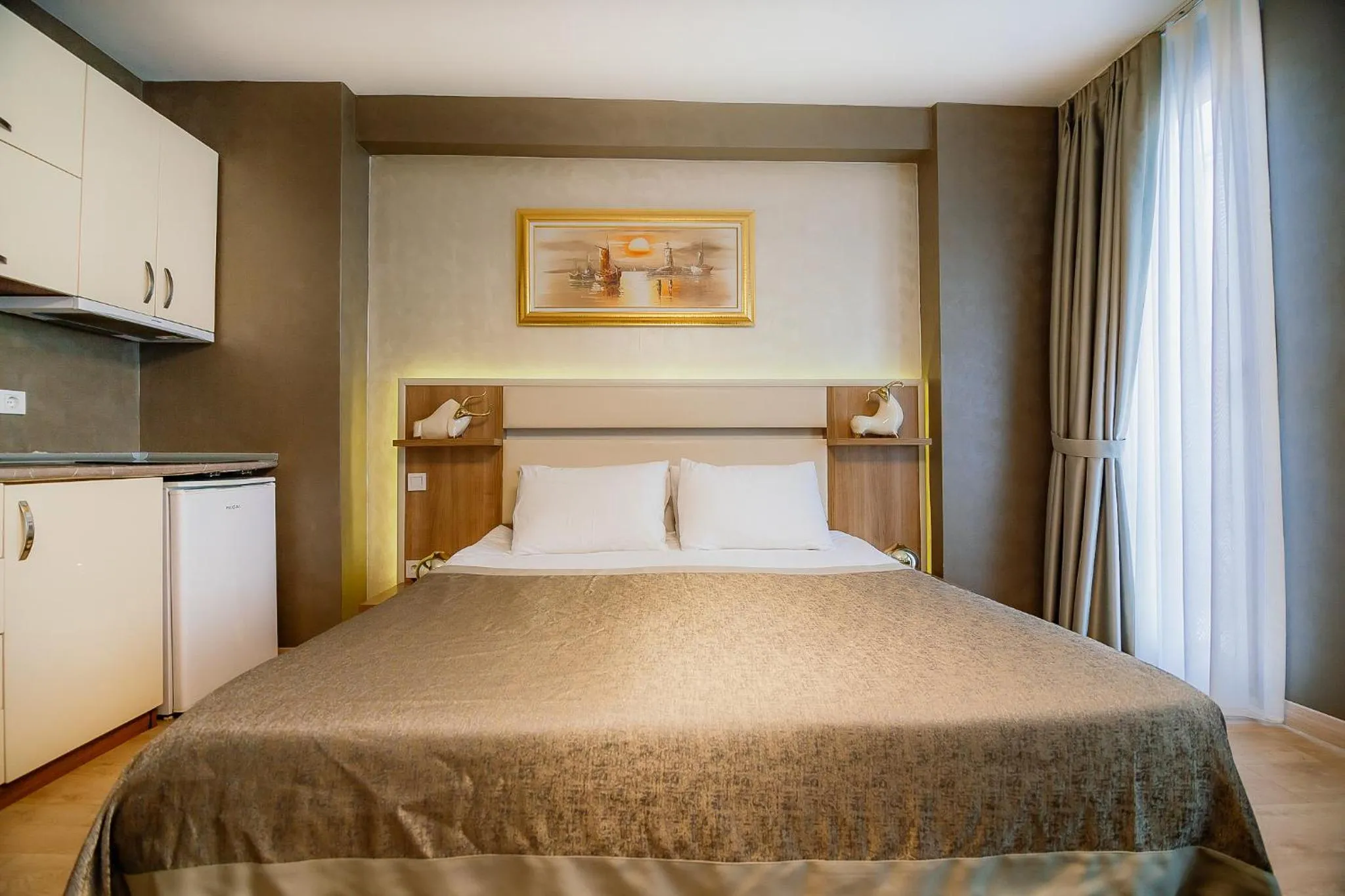 Bed in Kavalalı Suites