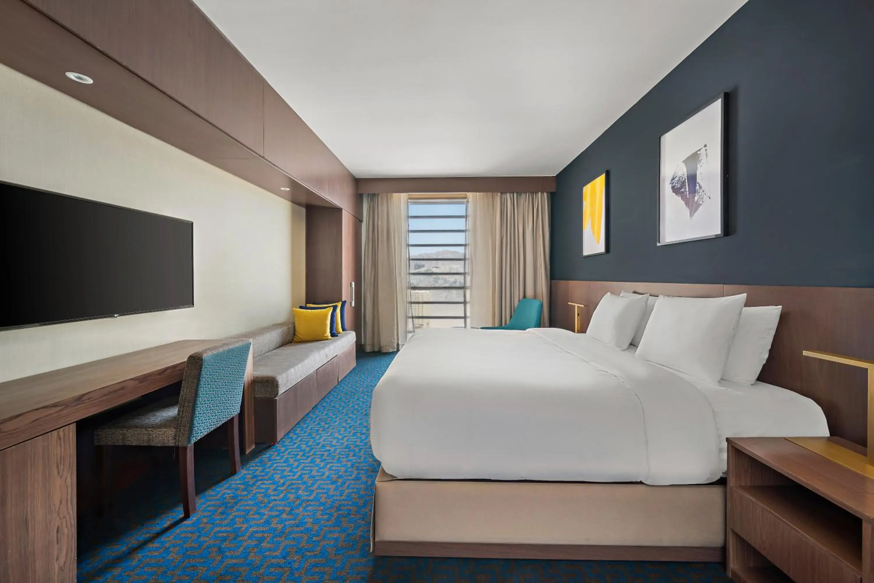 Bed in voco Makkah an IHG Hotel Bed in voco Makkah an IHG Hotel